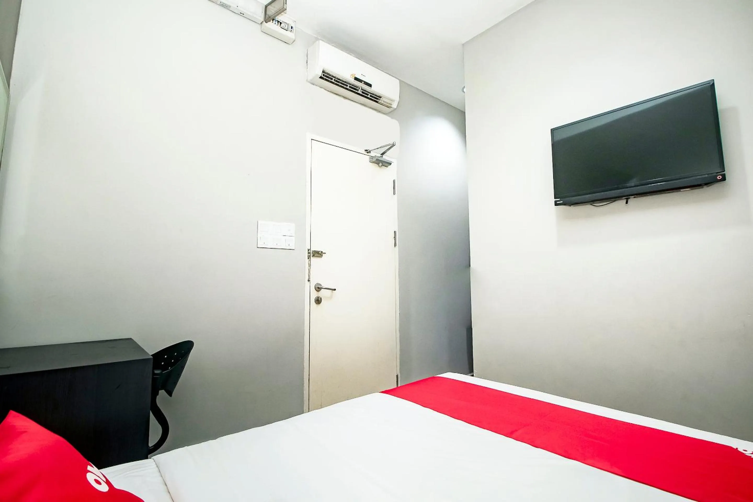 Bedroom, Bed in Hotel O Nice Stay Three Six Five Services