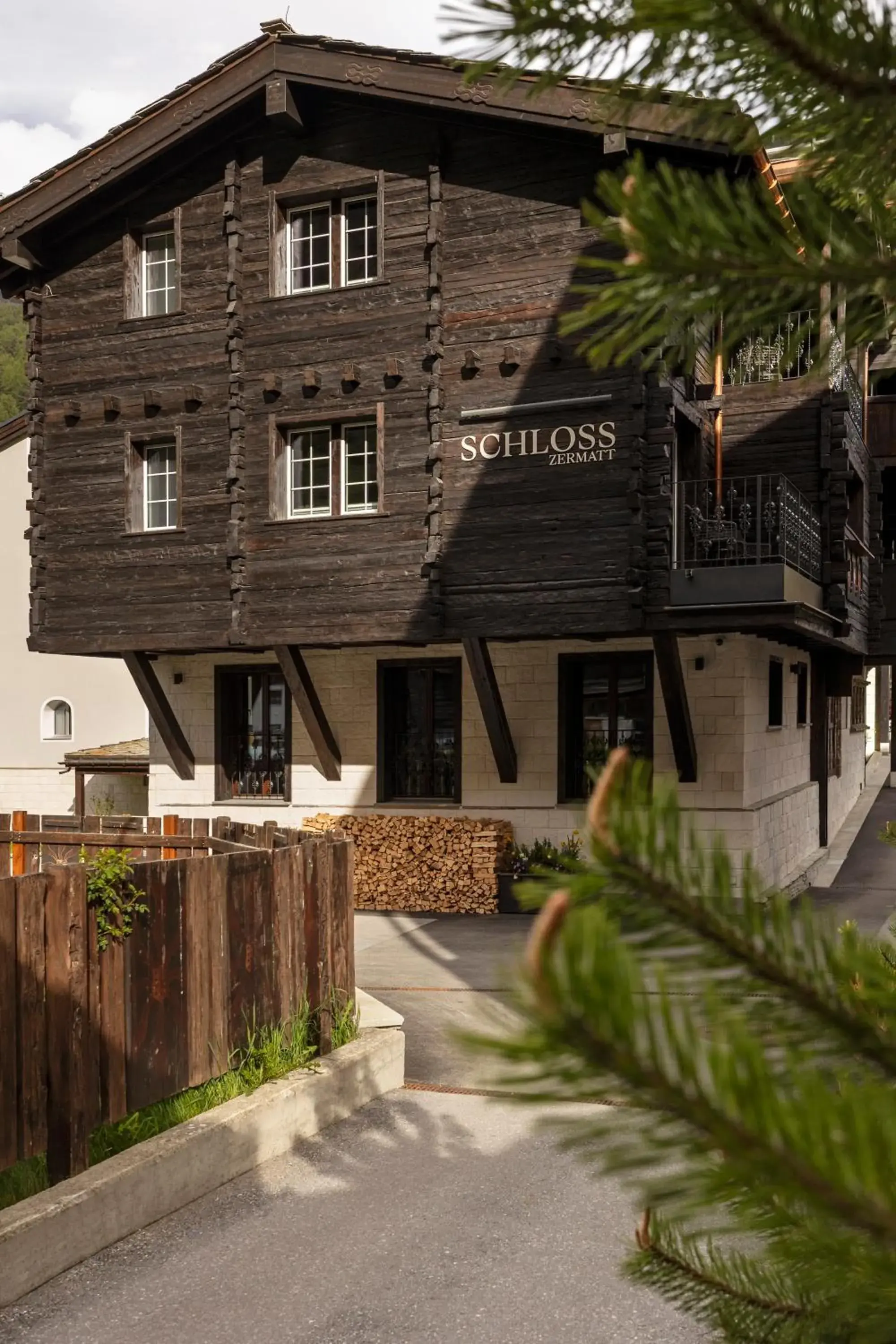 Property building in SCHLOSS Zermatt - CBD & Adaptogenic Spa and Sport Hotel Property building in SCHLOSS Zermatt - CBD & Adaptogenic Spa and Sport Hotel