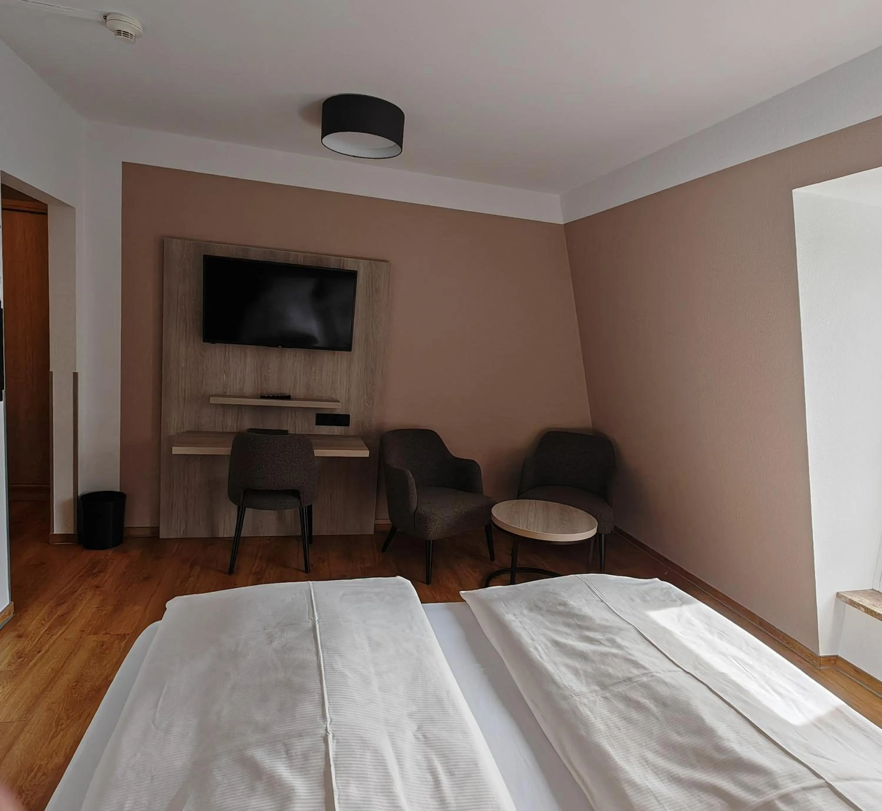 Photo of the whole room, Bed in Berghotel Kockelsberg