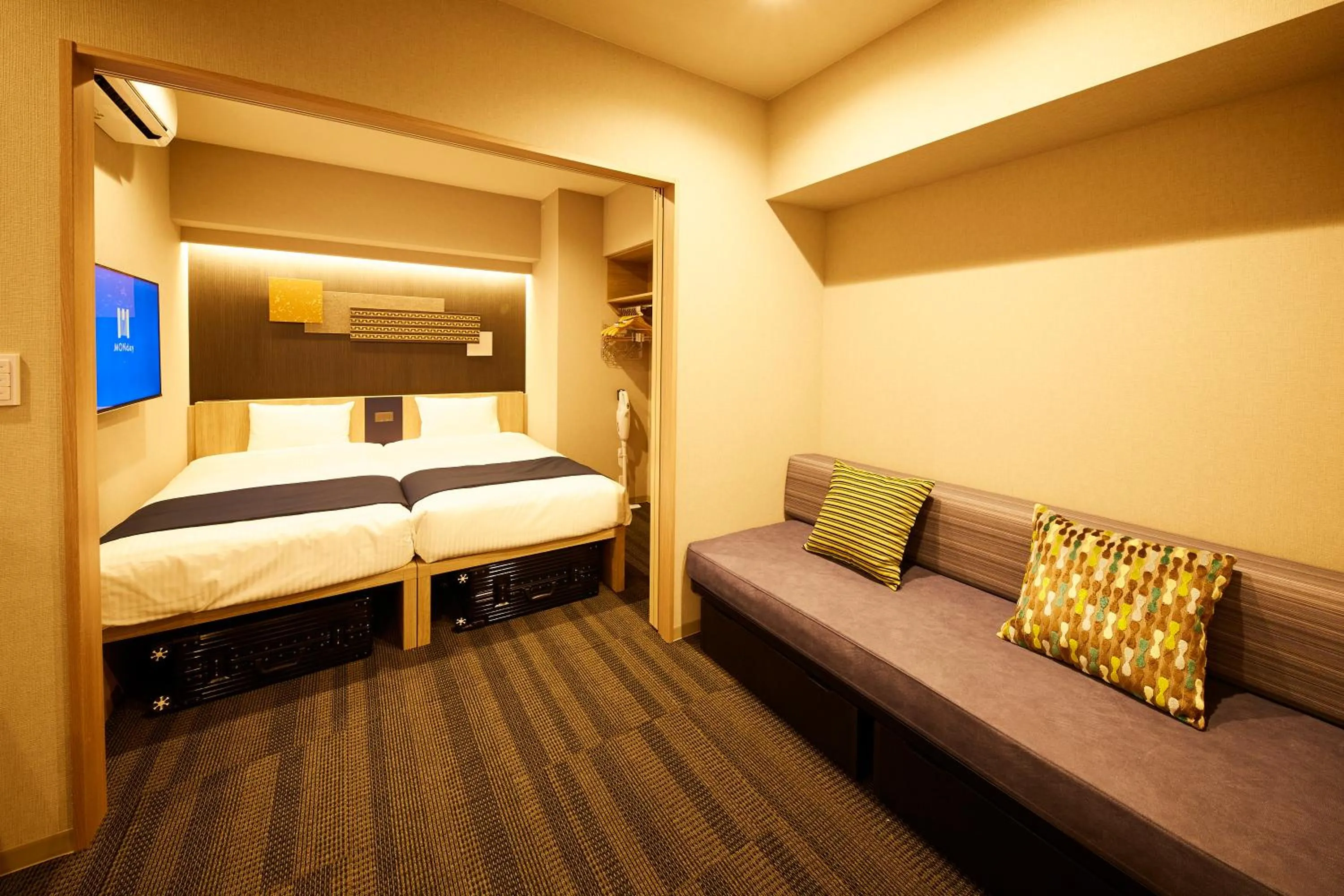 Photo of the whole room, Bed in MONday Apart Premium HAMAMATSUCHO