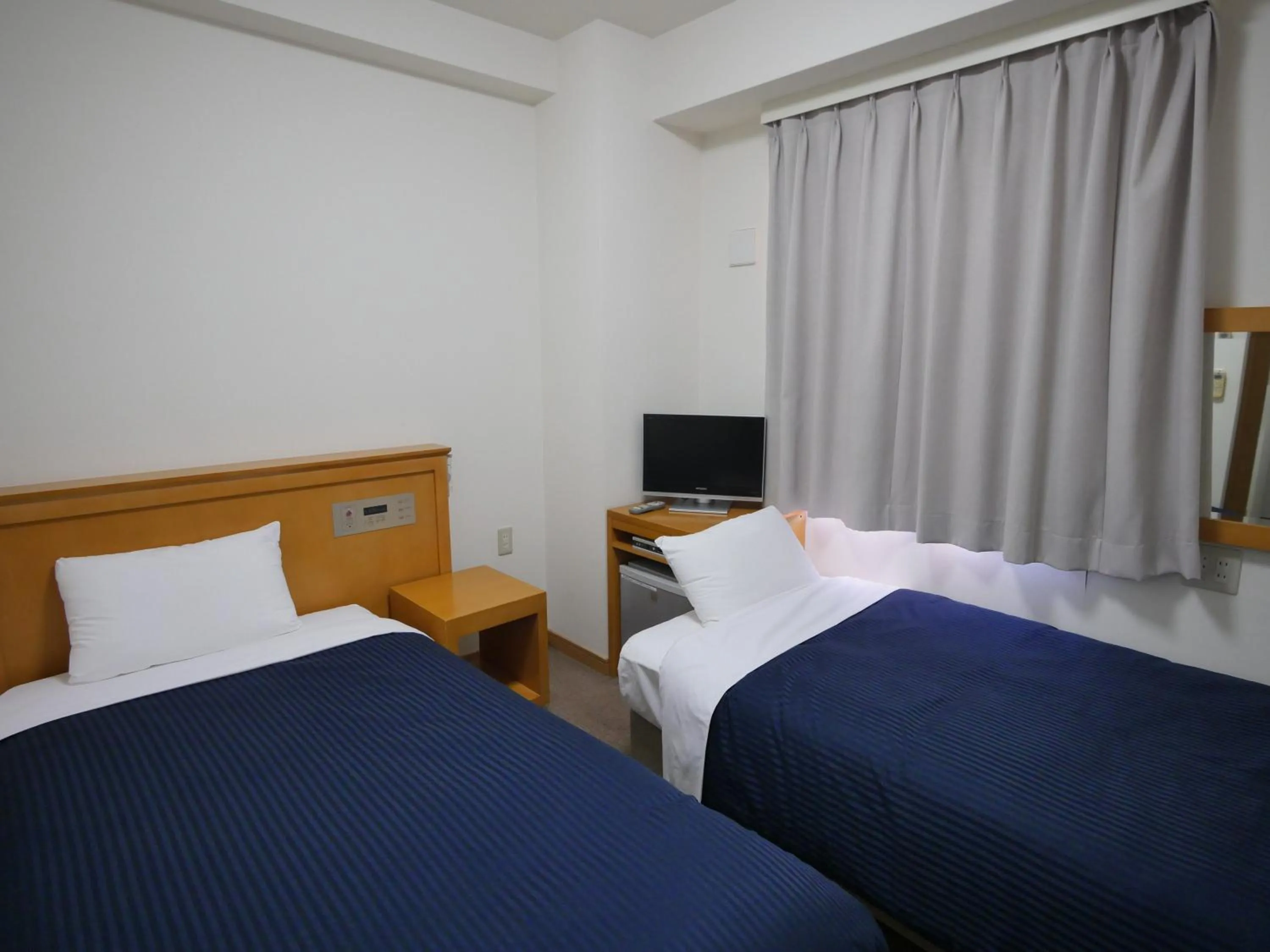 Photo of the whole room, Bed in Smile Hotel Shizuoka Yoshida Inter
