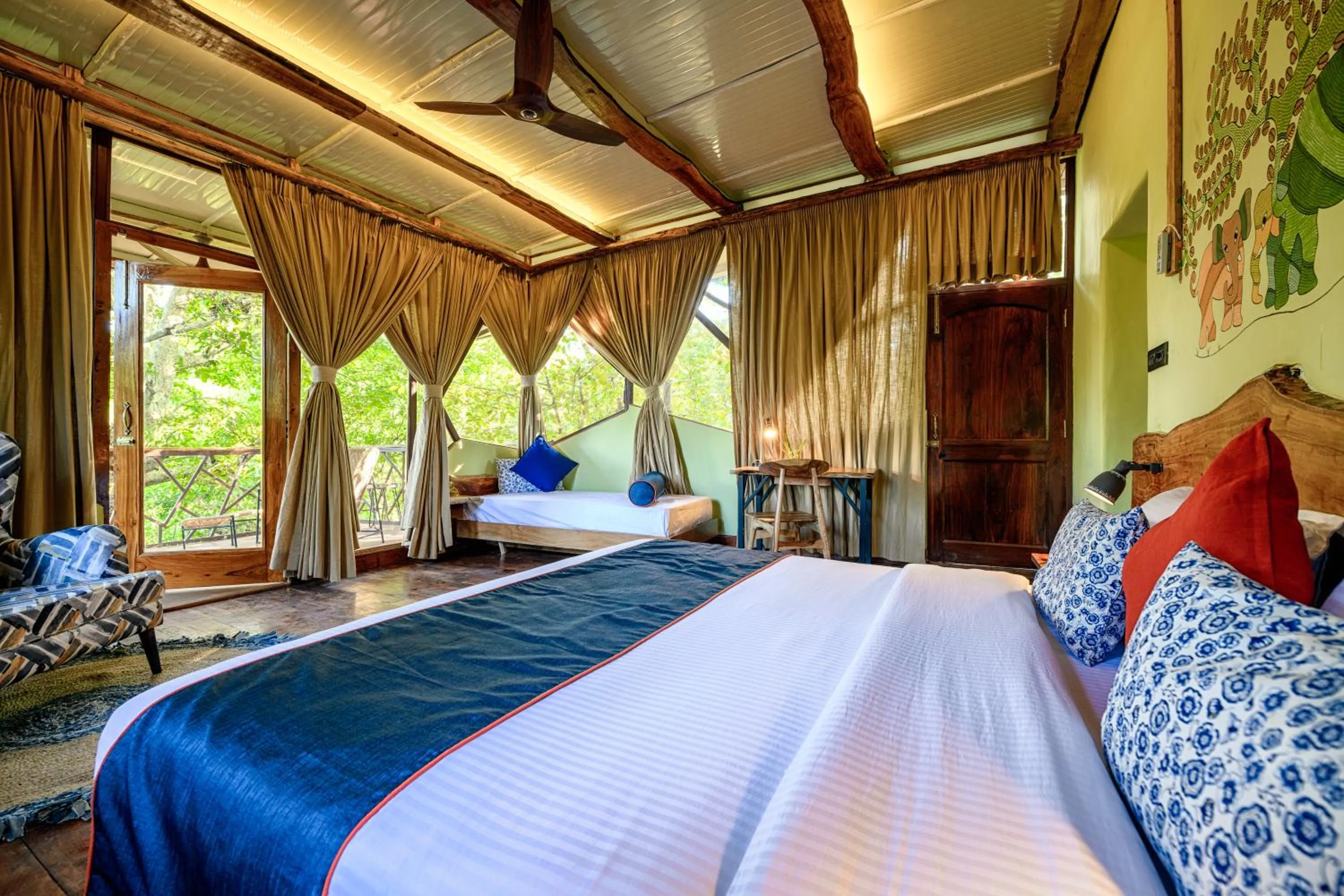 Bed in Kanha Jungle Camp