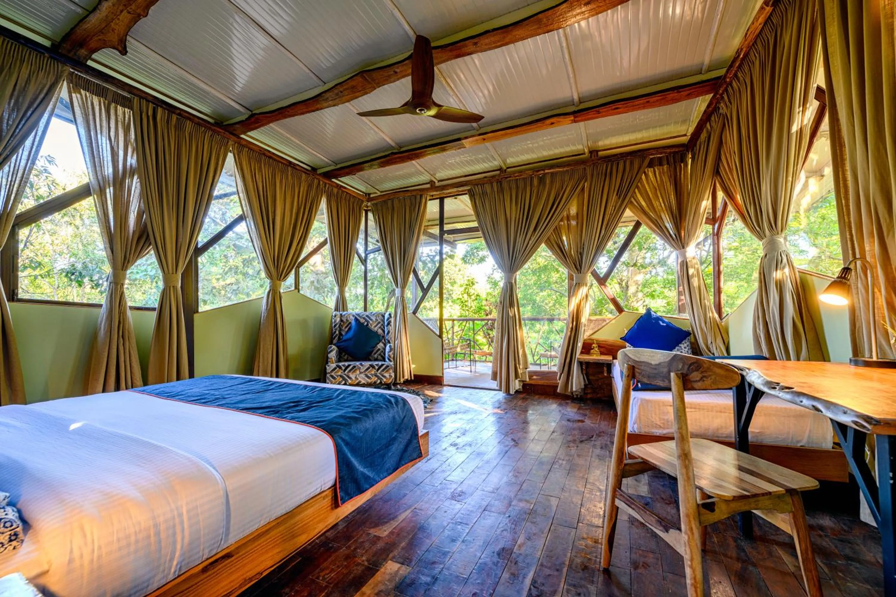 Photo of the whole room, Bed in Kanha Jungle Camp