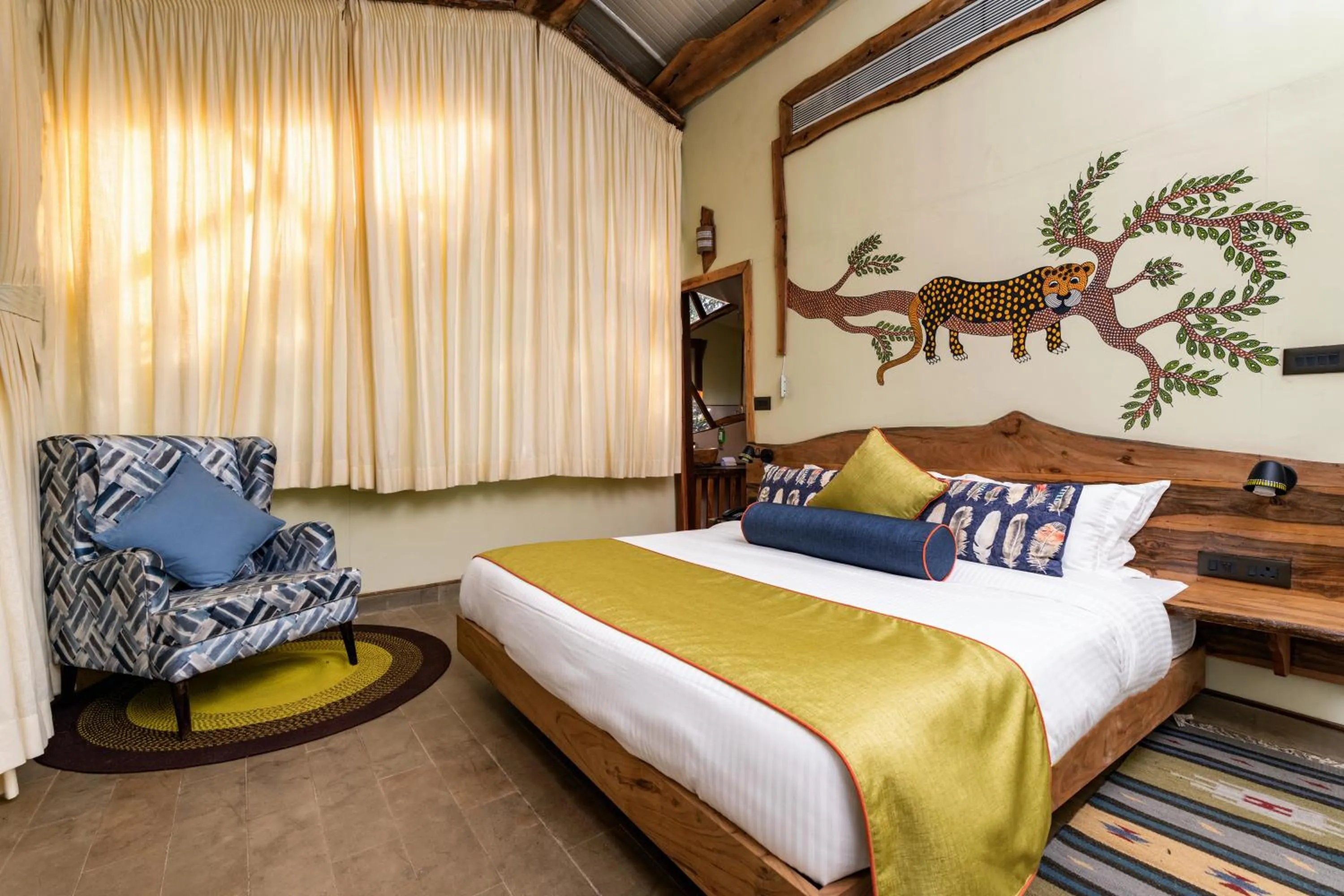 Bed in Kanha Jungle Camp