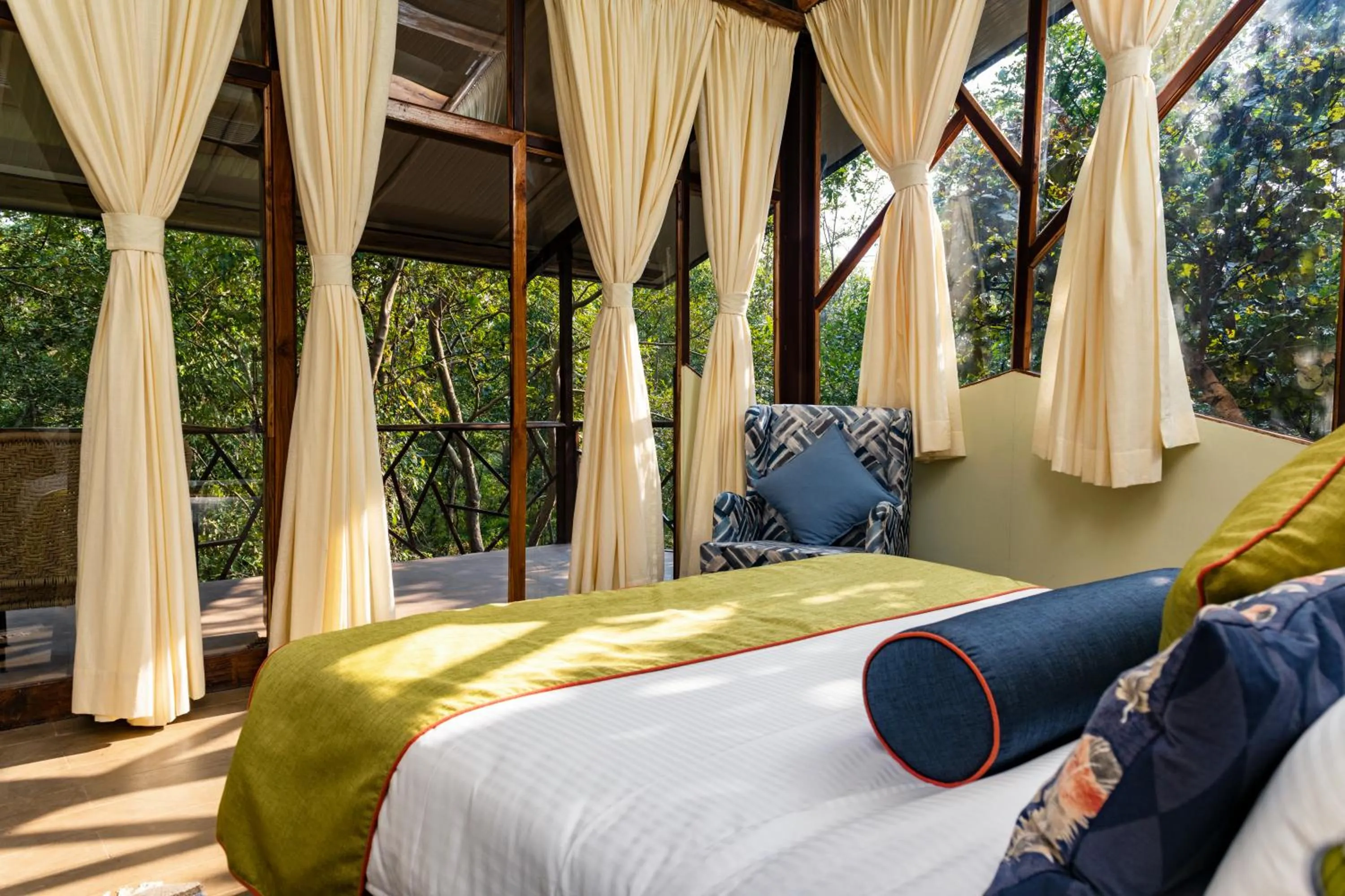 Bed in Kanha Jungle Camp