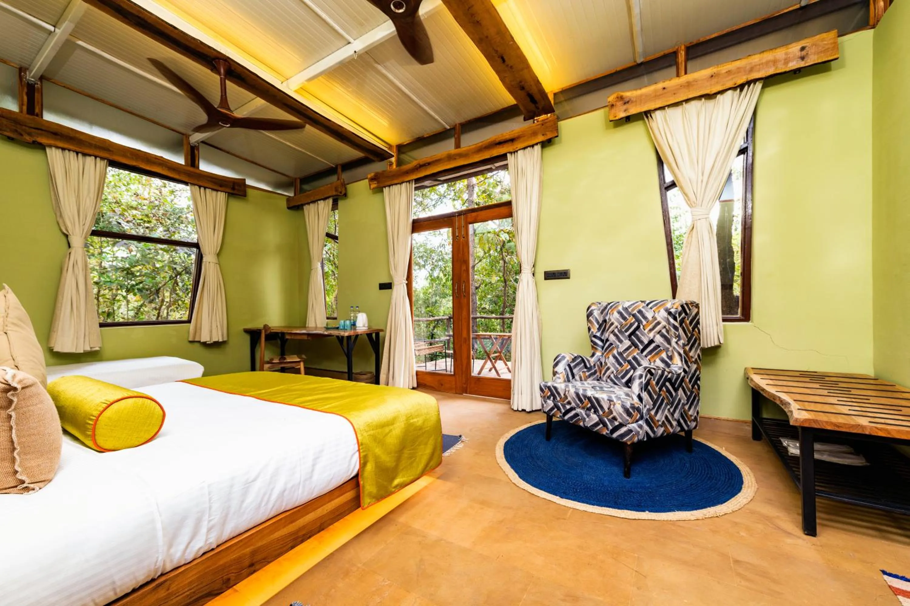 Bed in Kanha Jungle Camp