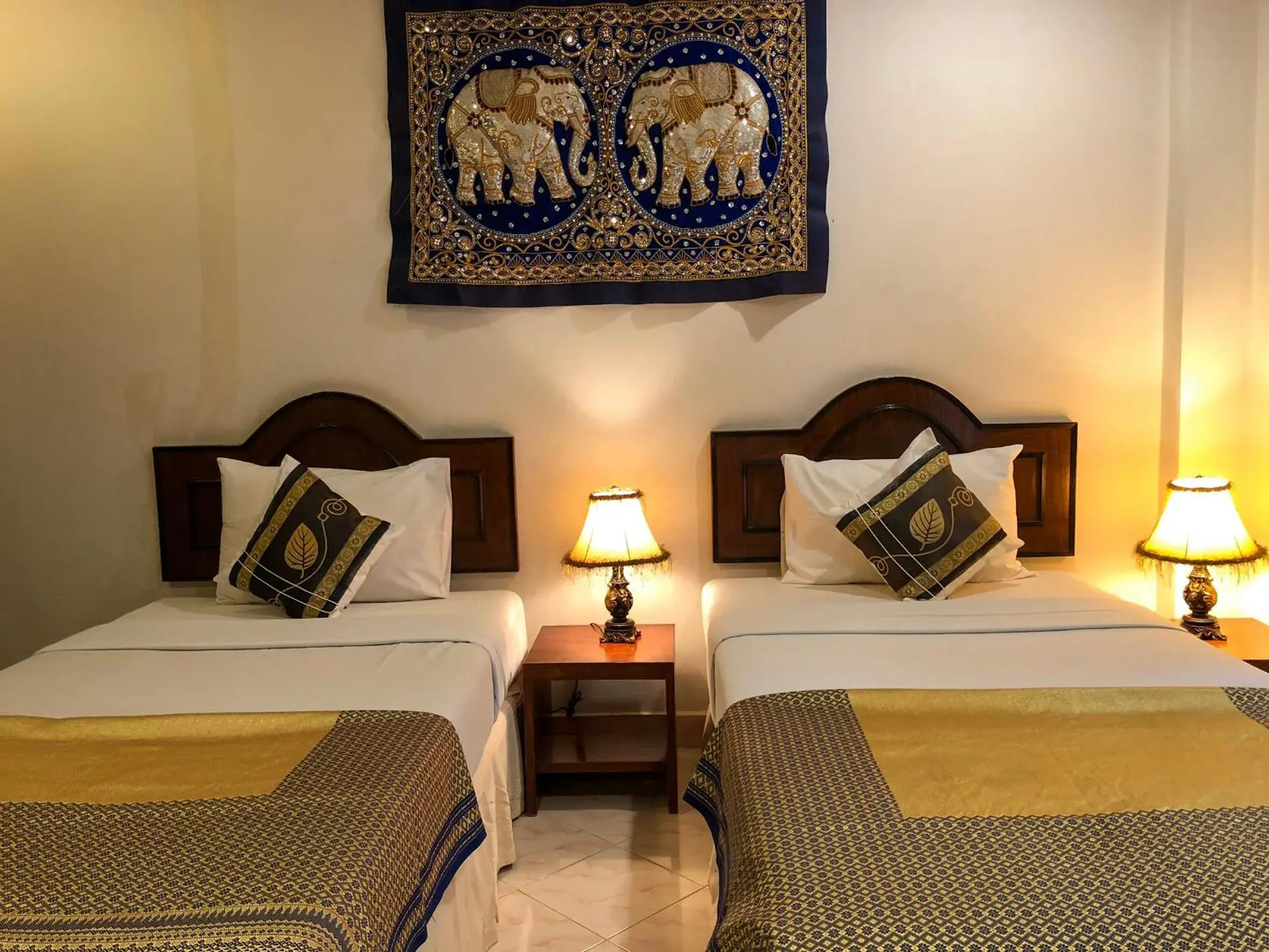 Bed in Ginis Beach Resort Bed in Ginis Beach Resort