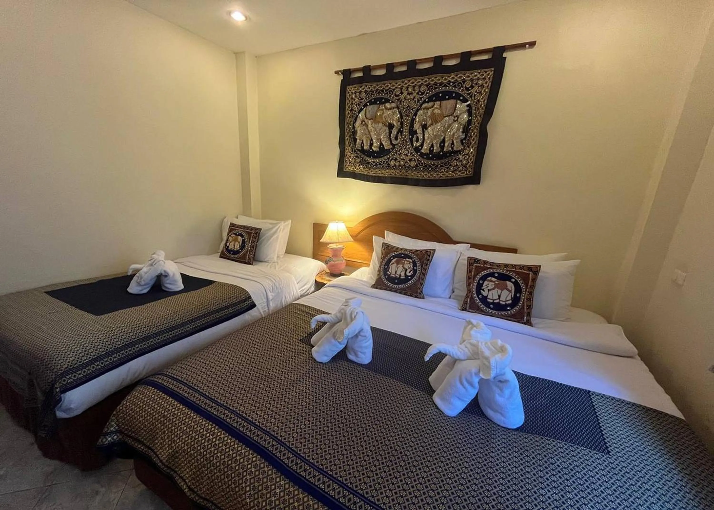 Bed in Ginis Beach Resort