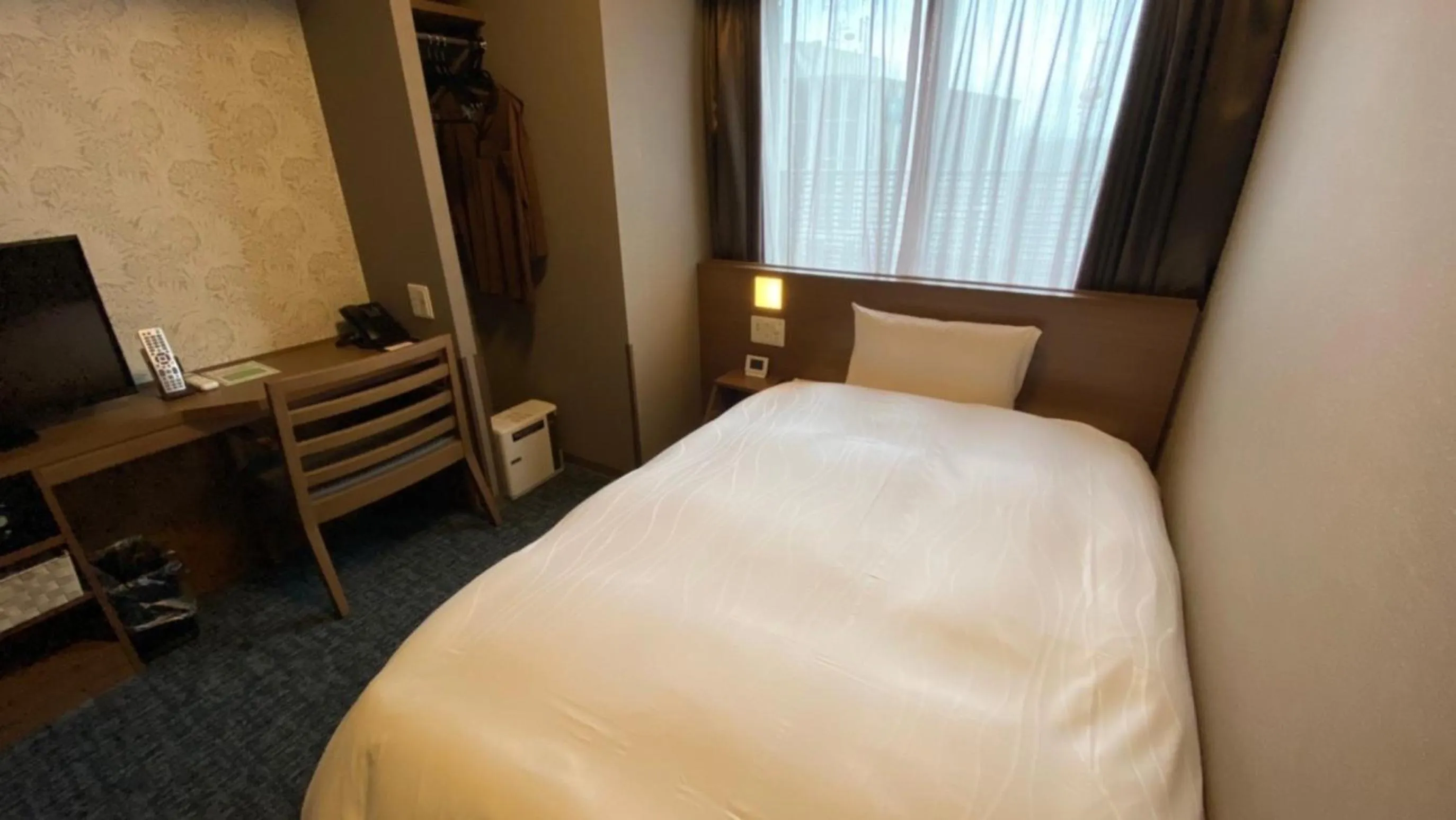 Bed in Dormy Inn Kobe Motomachi Natural Hot Springs