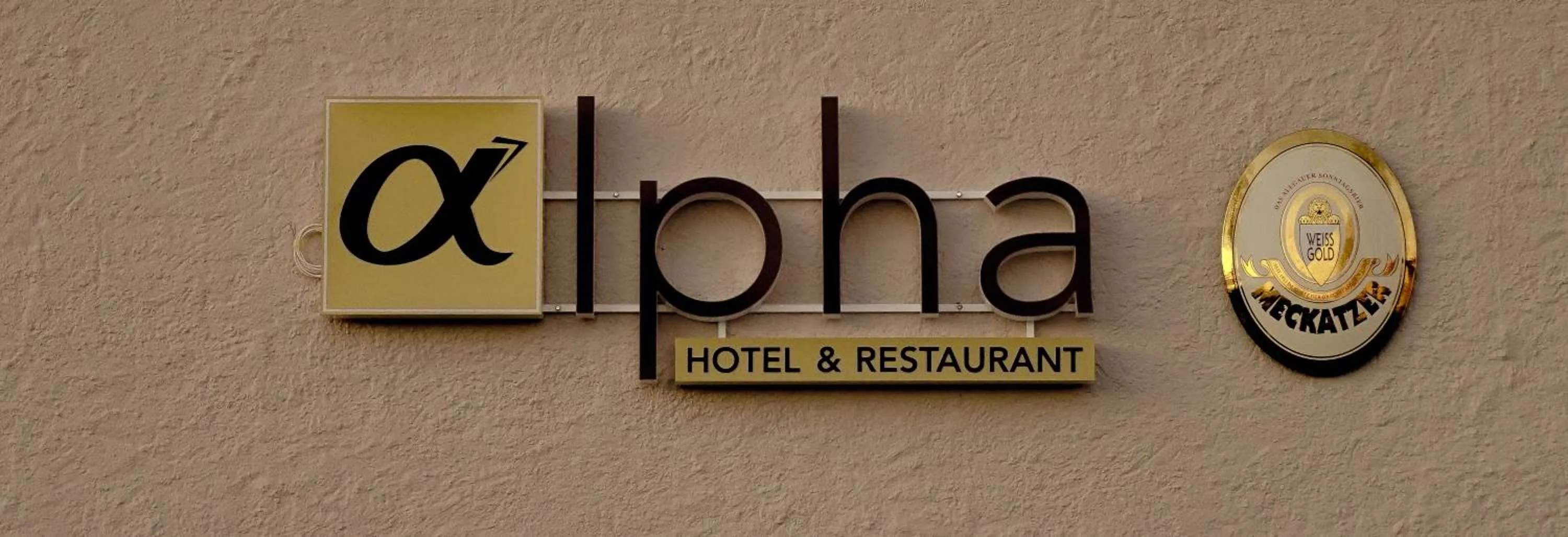 Property logo or sign in Hotel-Restaurant Alpha