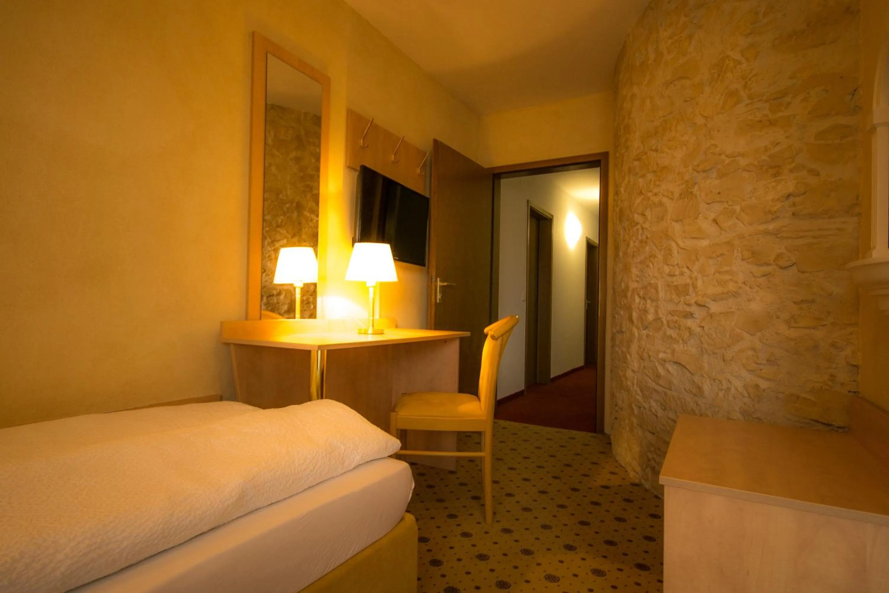 Seating area, Bed in Hotel-Restaurant Alpha