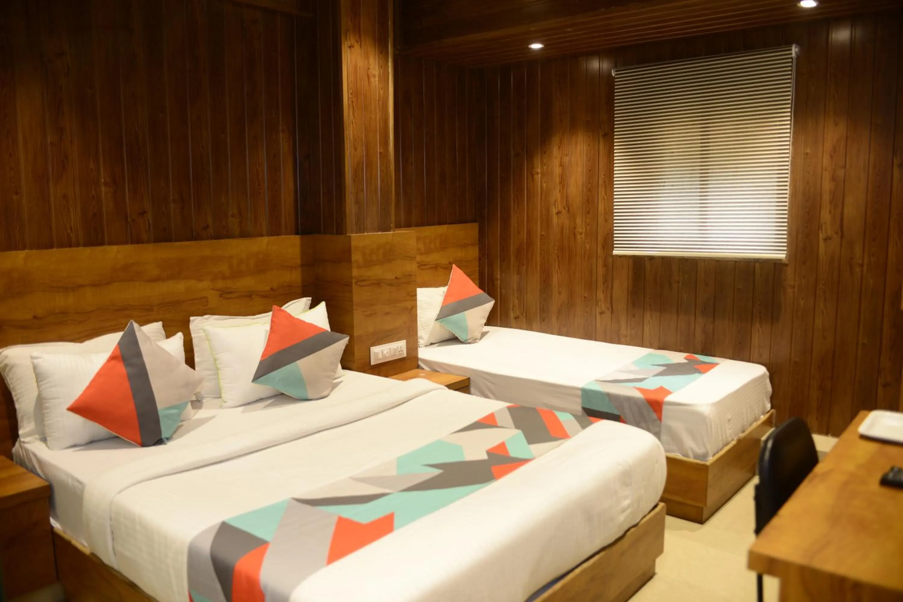 Photo of the whole room, Bed in Hotel Malad Inn opposite Malad Railway Station