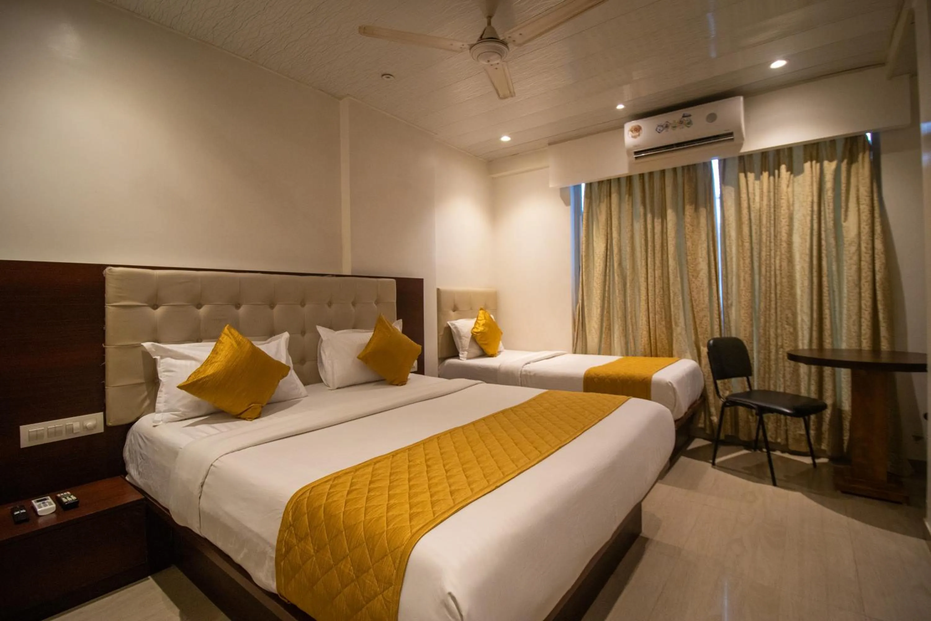 Photo of the whole room, Bed in Hotel Malad Inn opposite Malad Railway Station