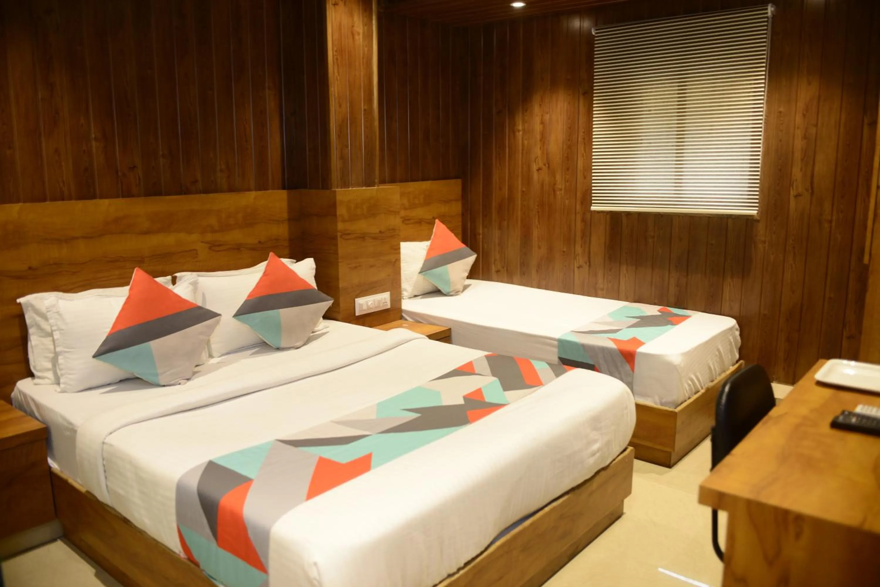 Photo of the whole room, Bed in Hotel Malad Inn opposite Malad Railway Station