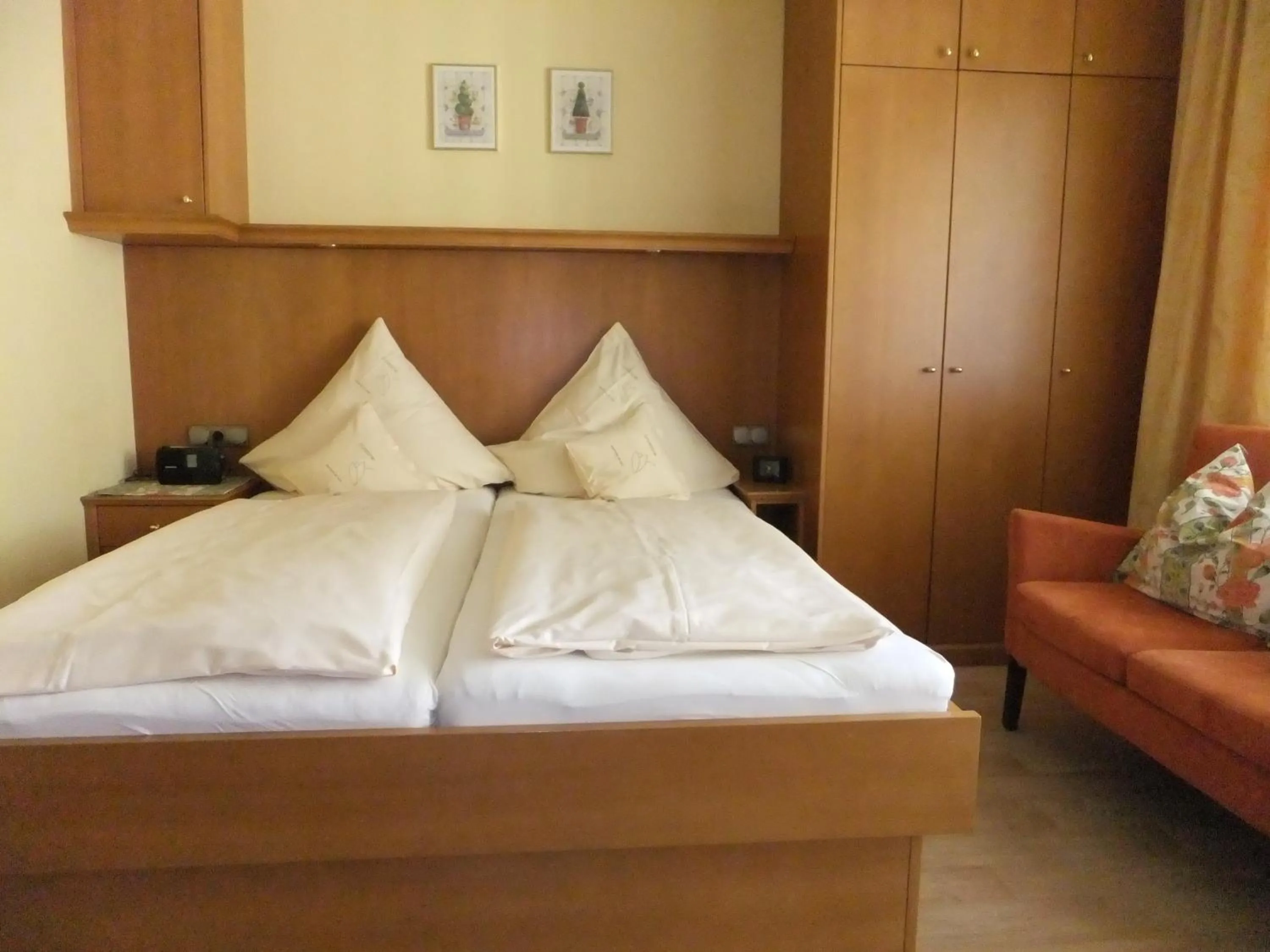 Bed in Aparthotel Christine