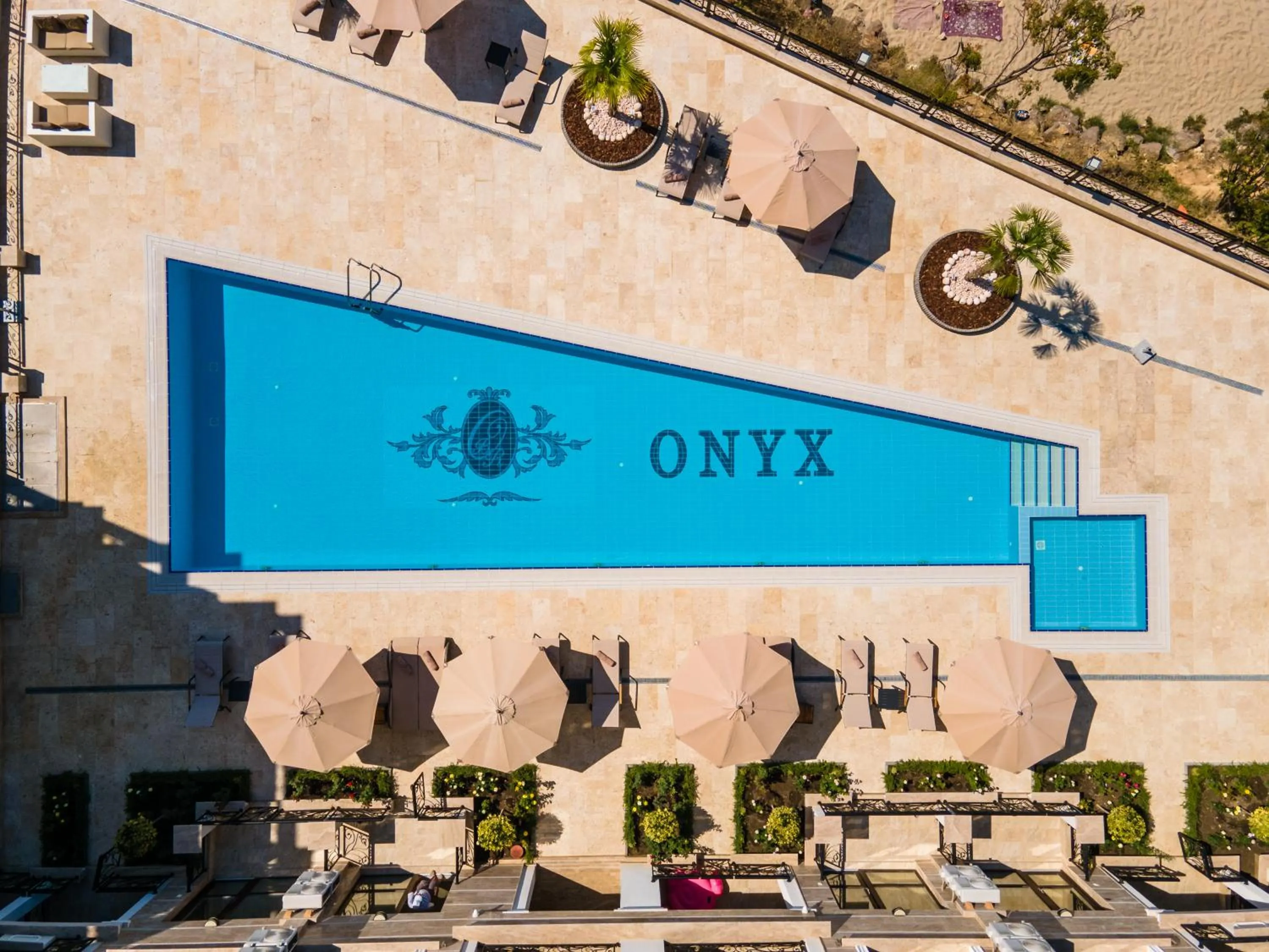 Swimming pool in Onyx Beach Residence - Free Beach Access & Parking