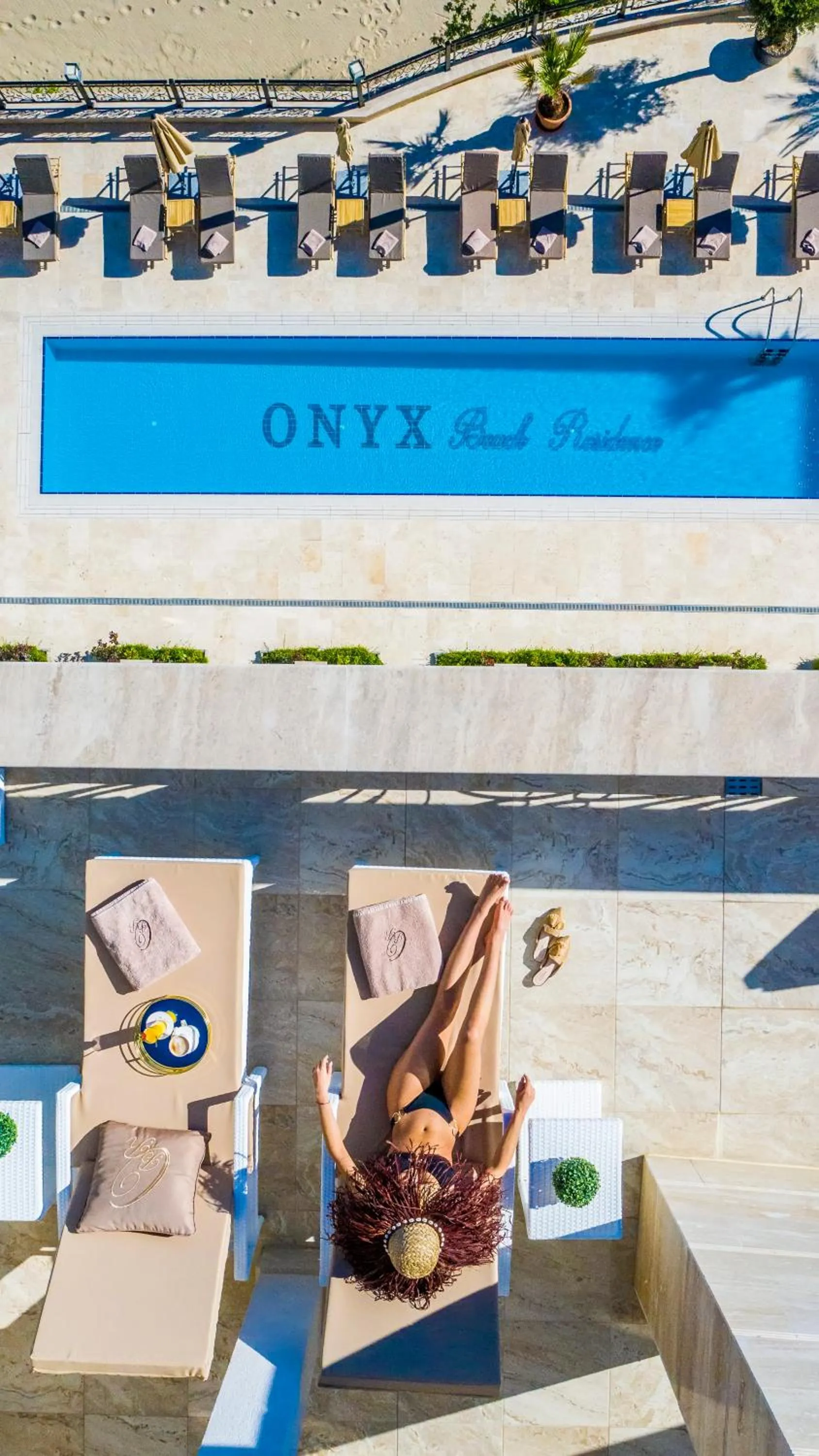 Swimming pool in Onyx Beach Residence - Free Beach Access & Parking