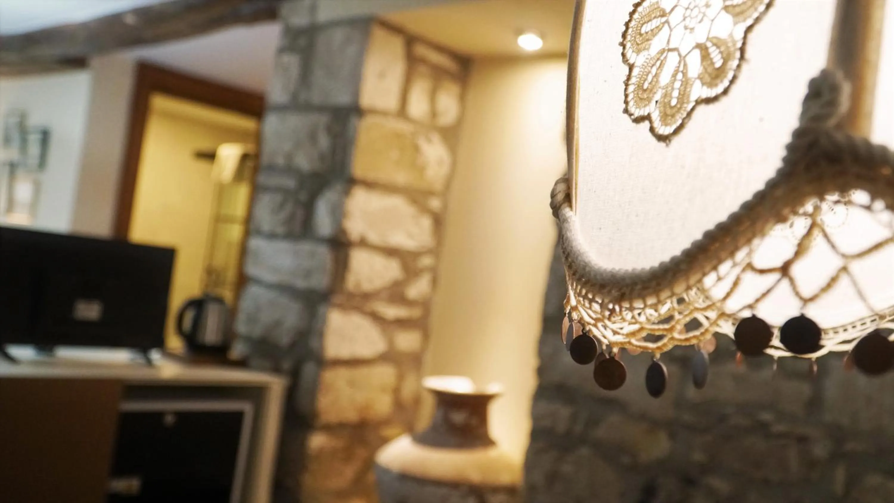 Communal lounge/ TV room in Urla Taş Konak Otel