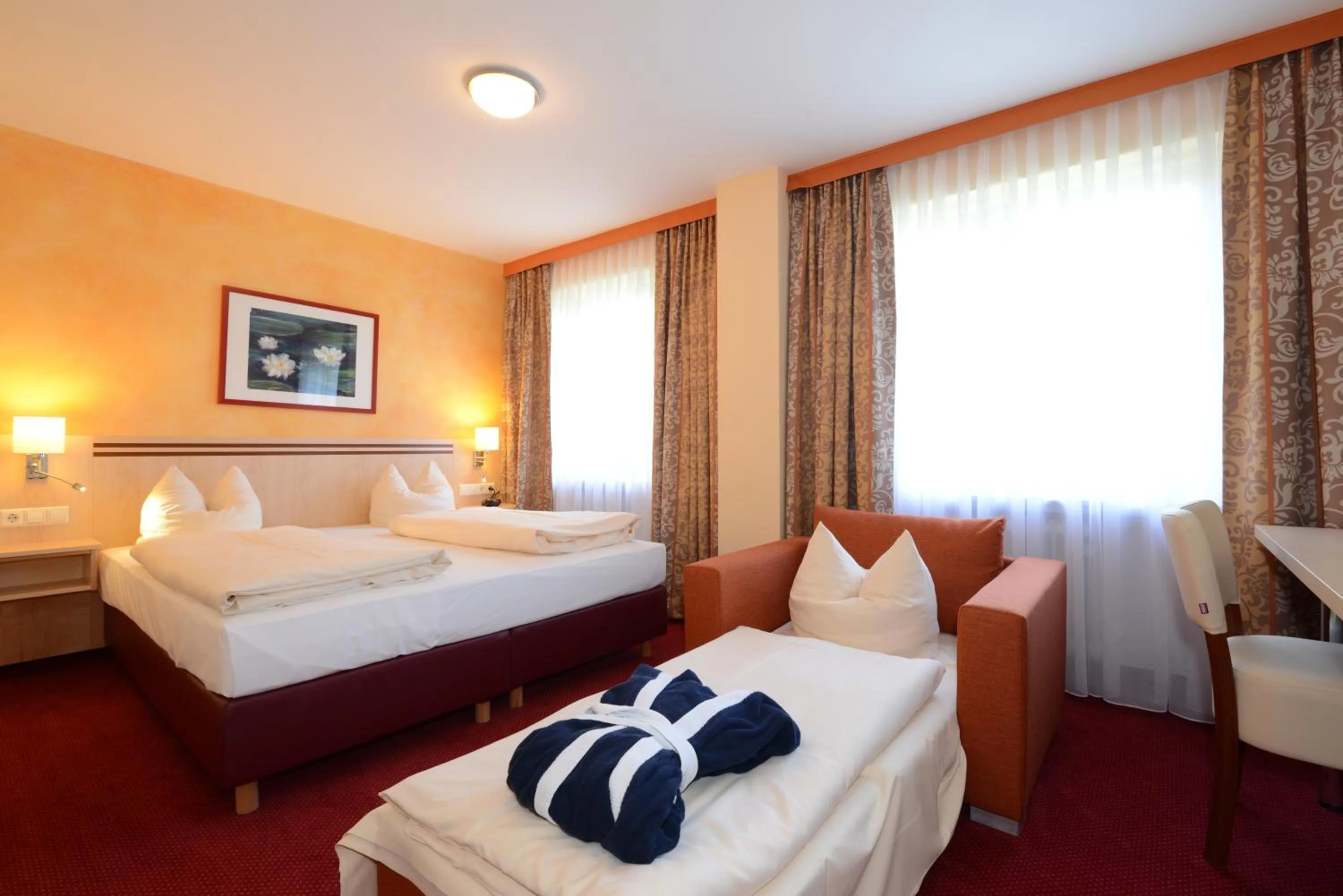 Bedroom in Hotel Apollo Garni