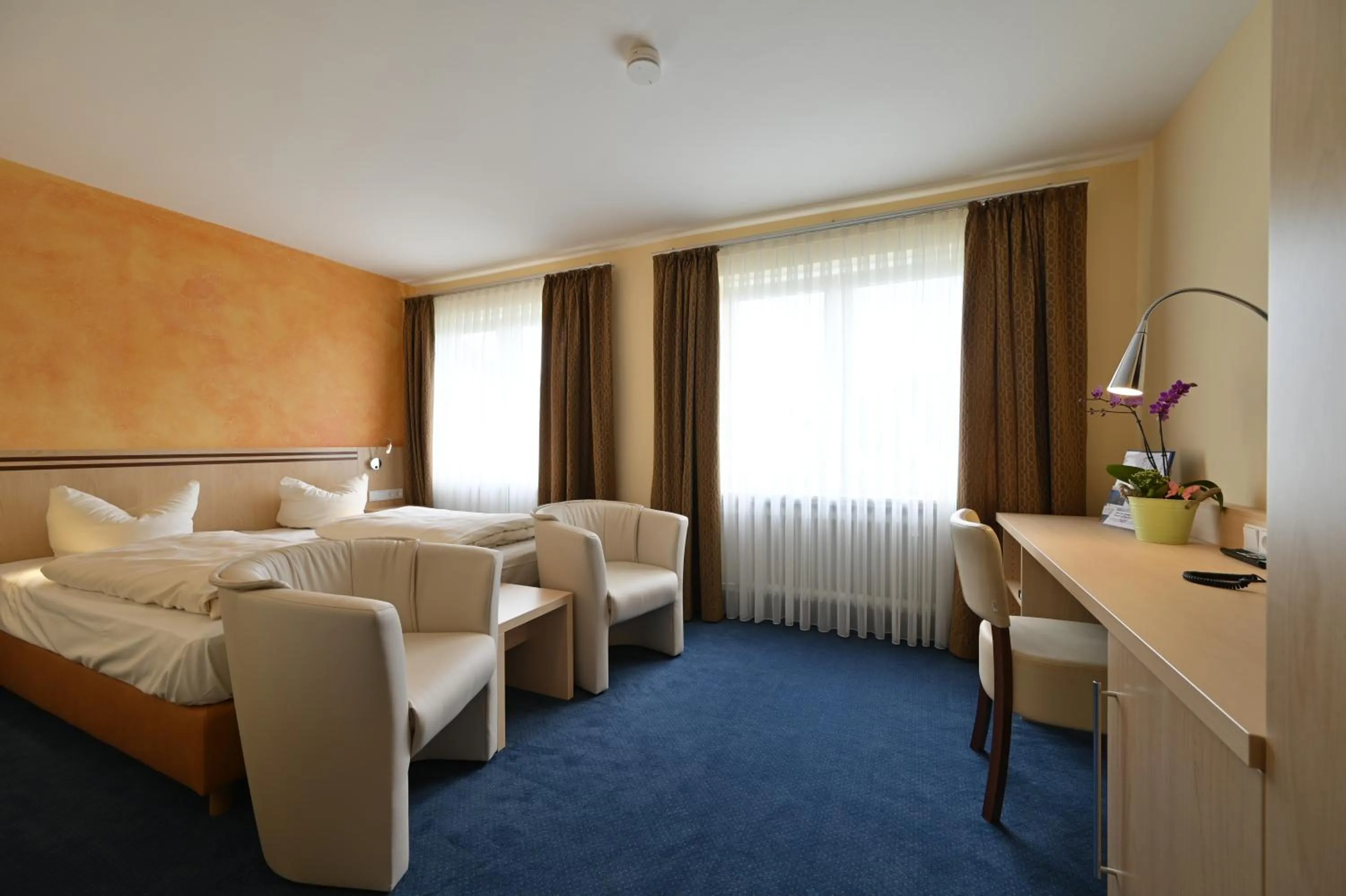 Bed in Hotel Apollo Garni