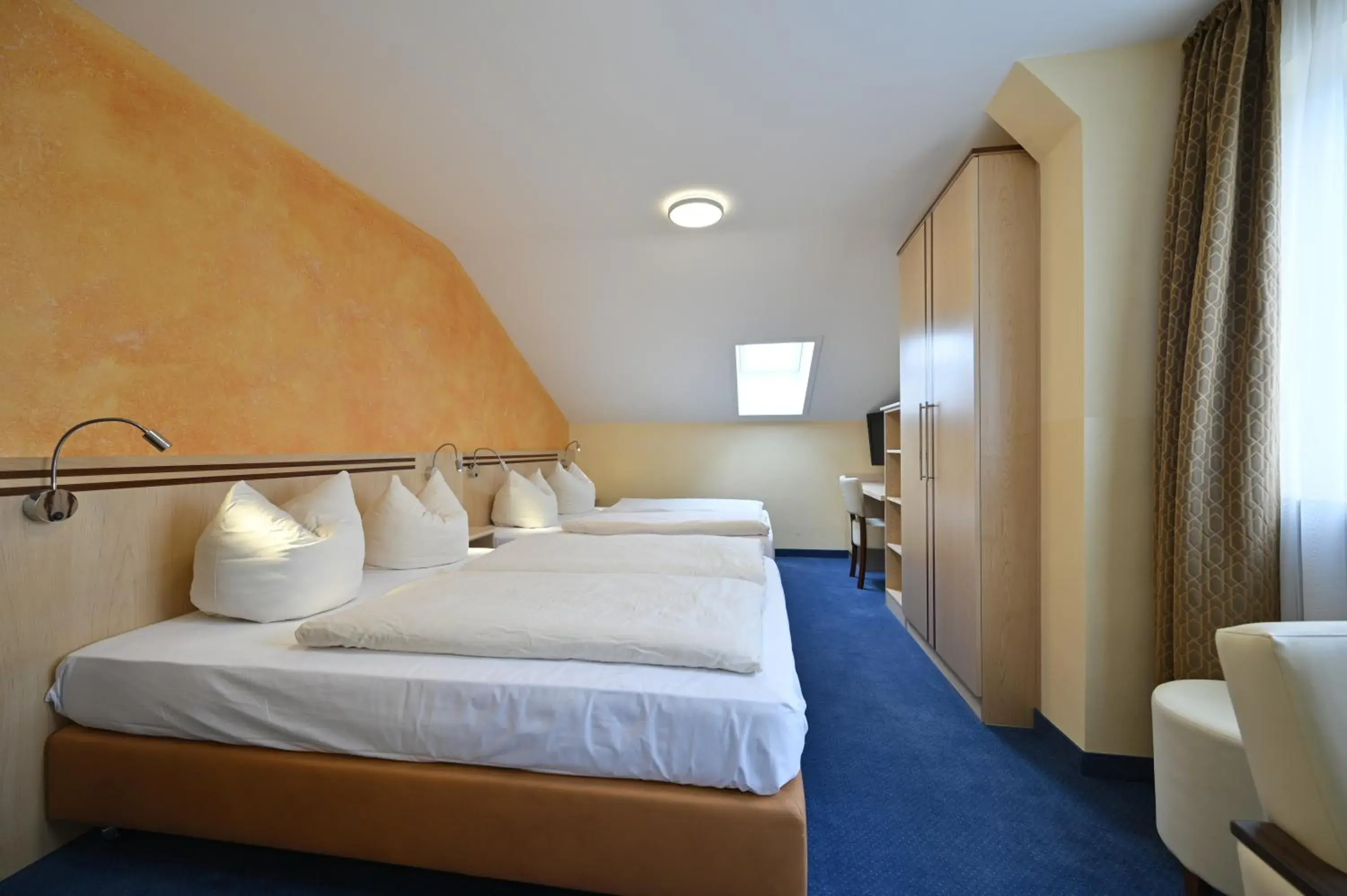 Triple Room in Hotel Apollo Garni Triple Room in Hotel Apollo Garni