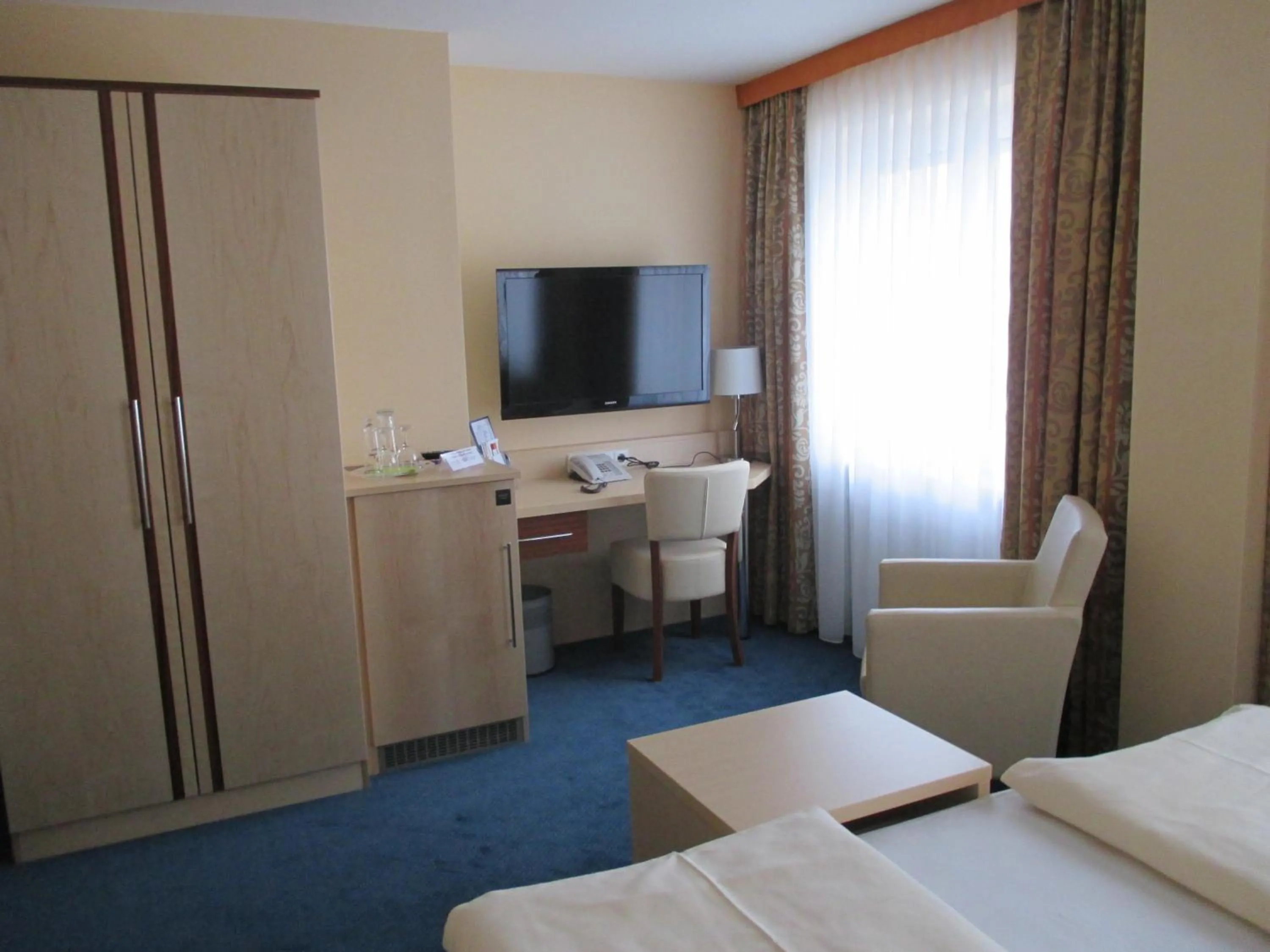 Photo of the whole room in Hotel Apollo Garni