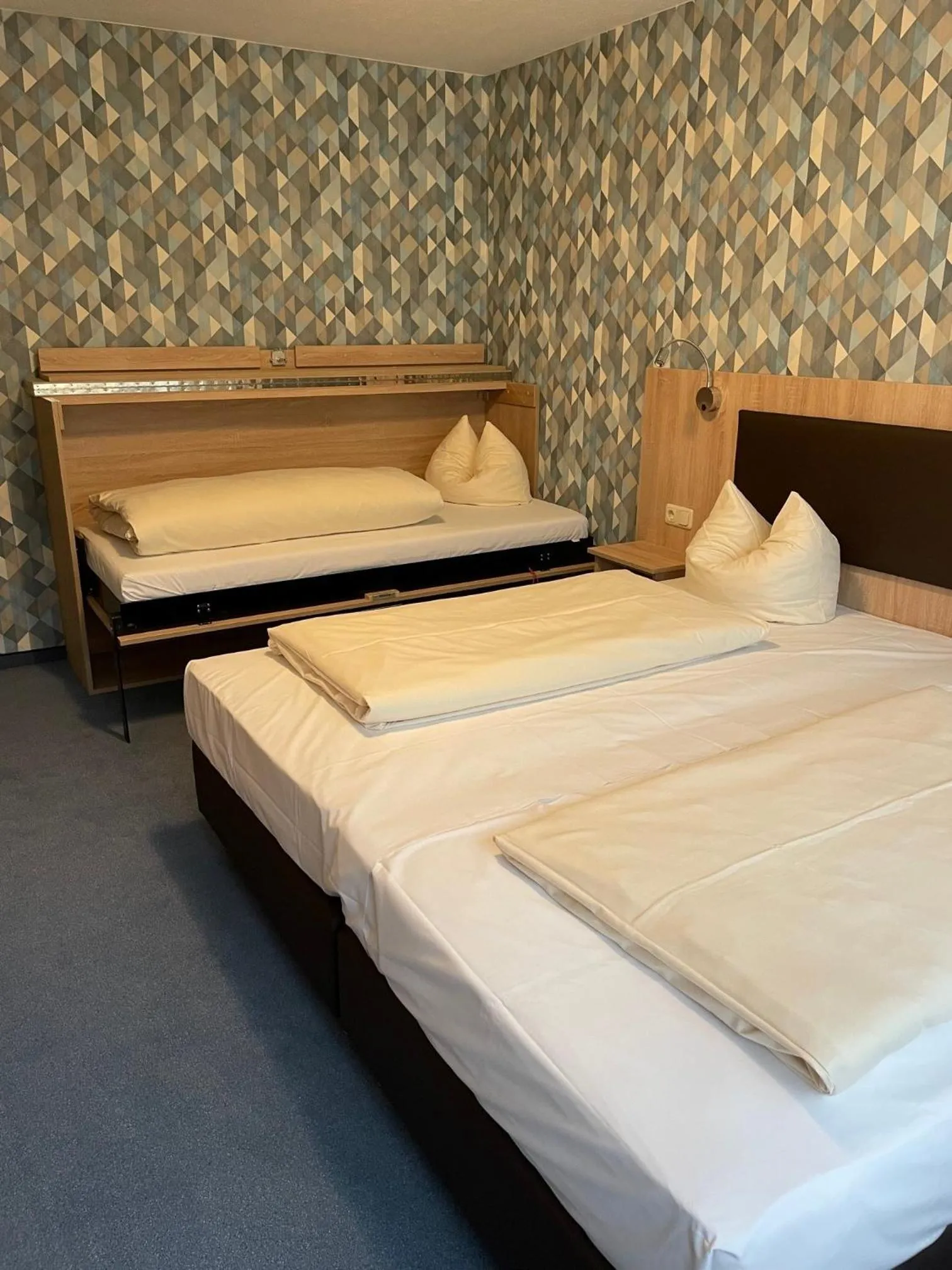 Bedroom in Hotel Apollo Garni