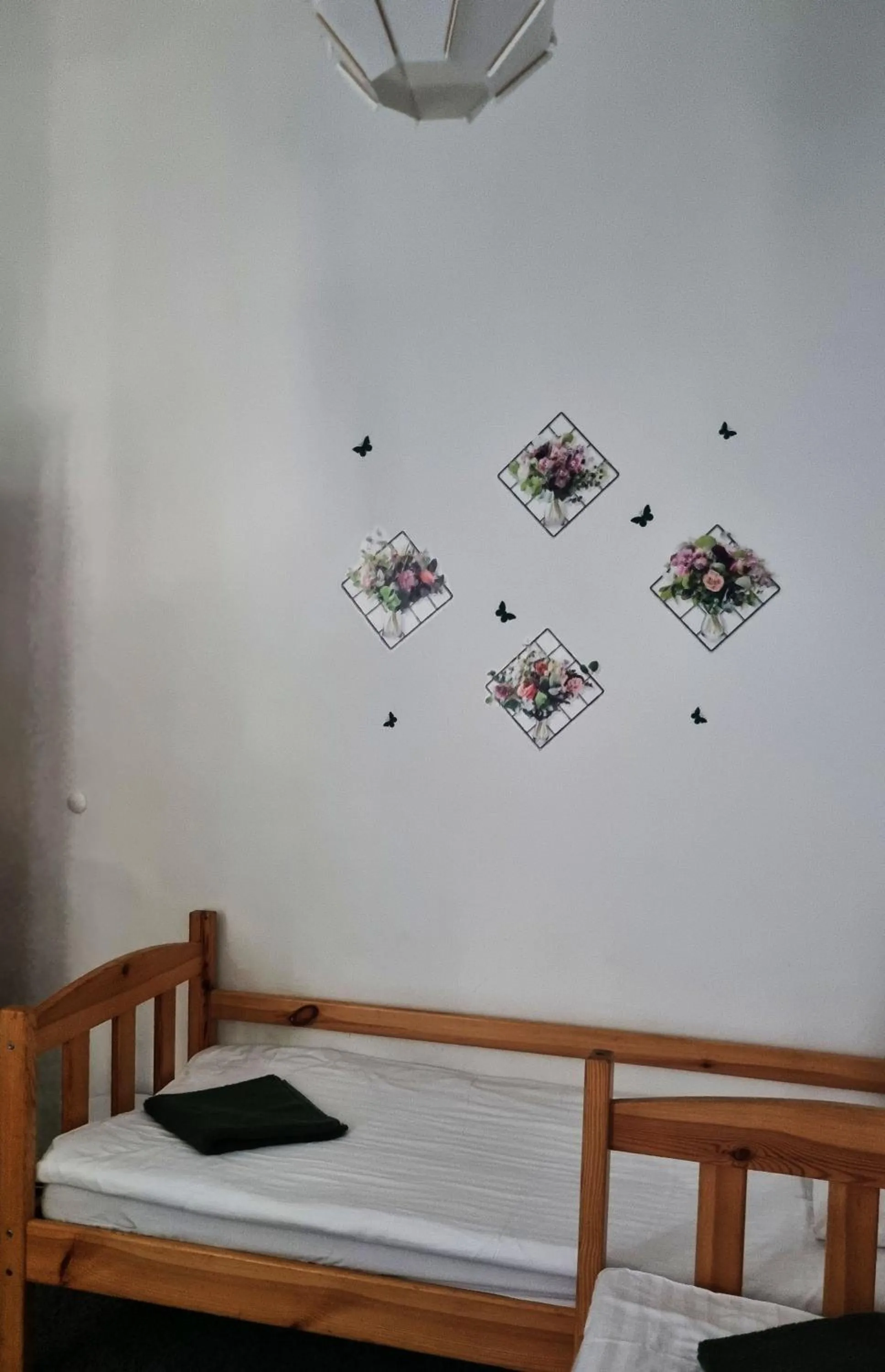 Bed in Green Cat Rooms