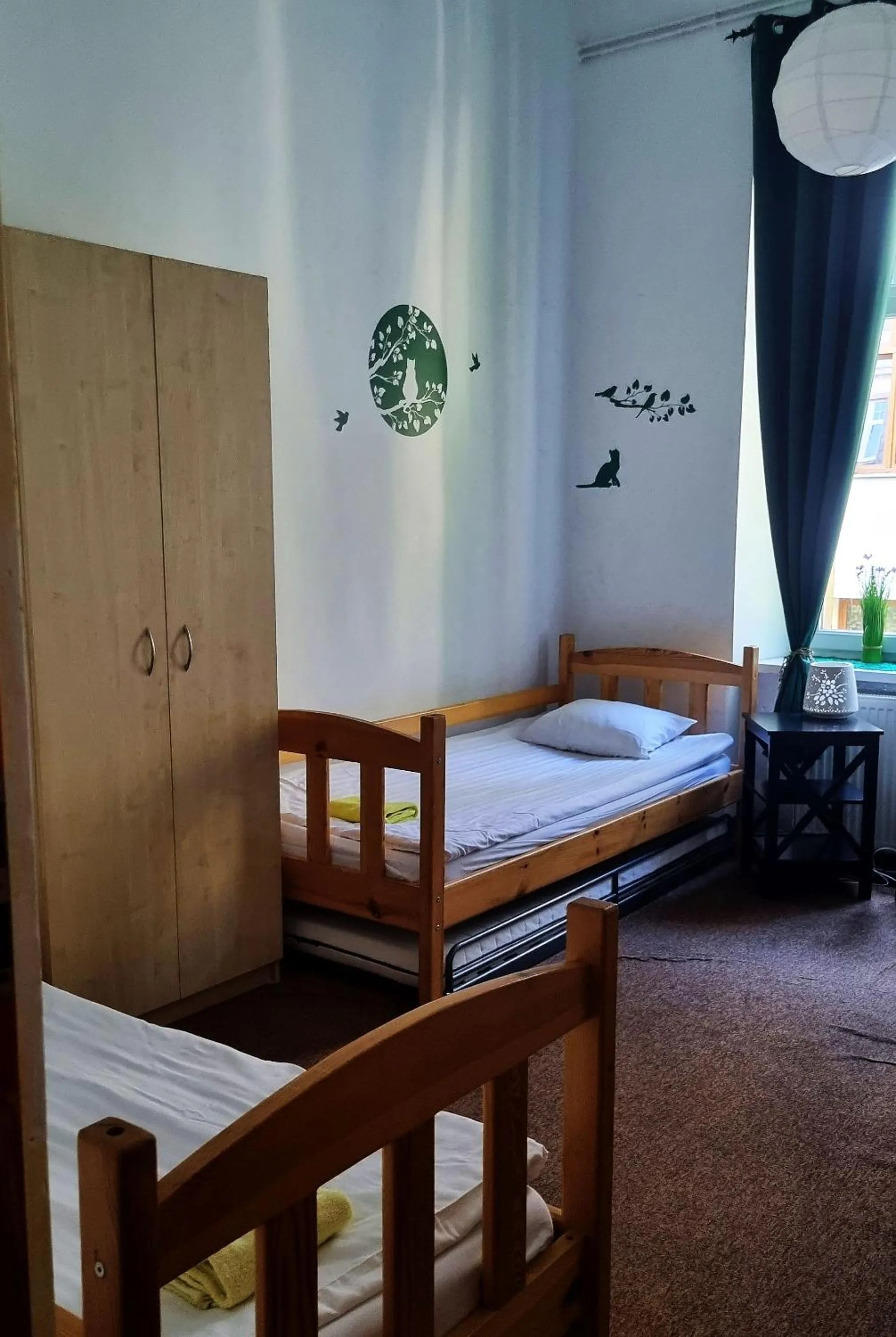 Bed in Green Cat Rooms