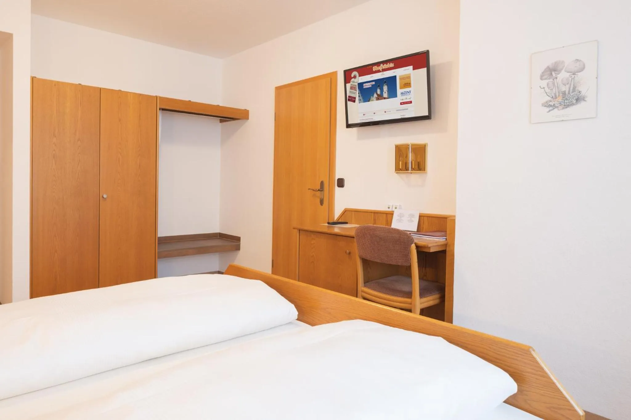 Photo of the whole room, Bed in AKZENT Hotel Meerfräulein