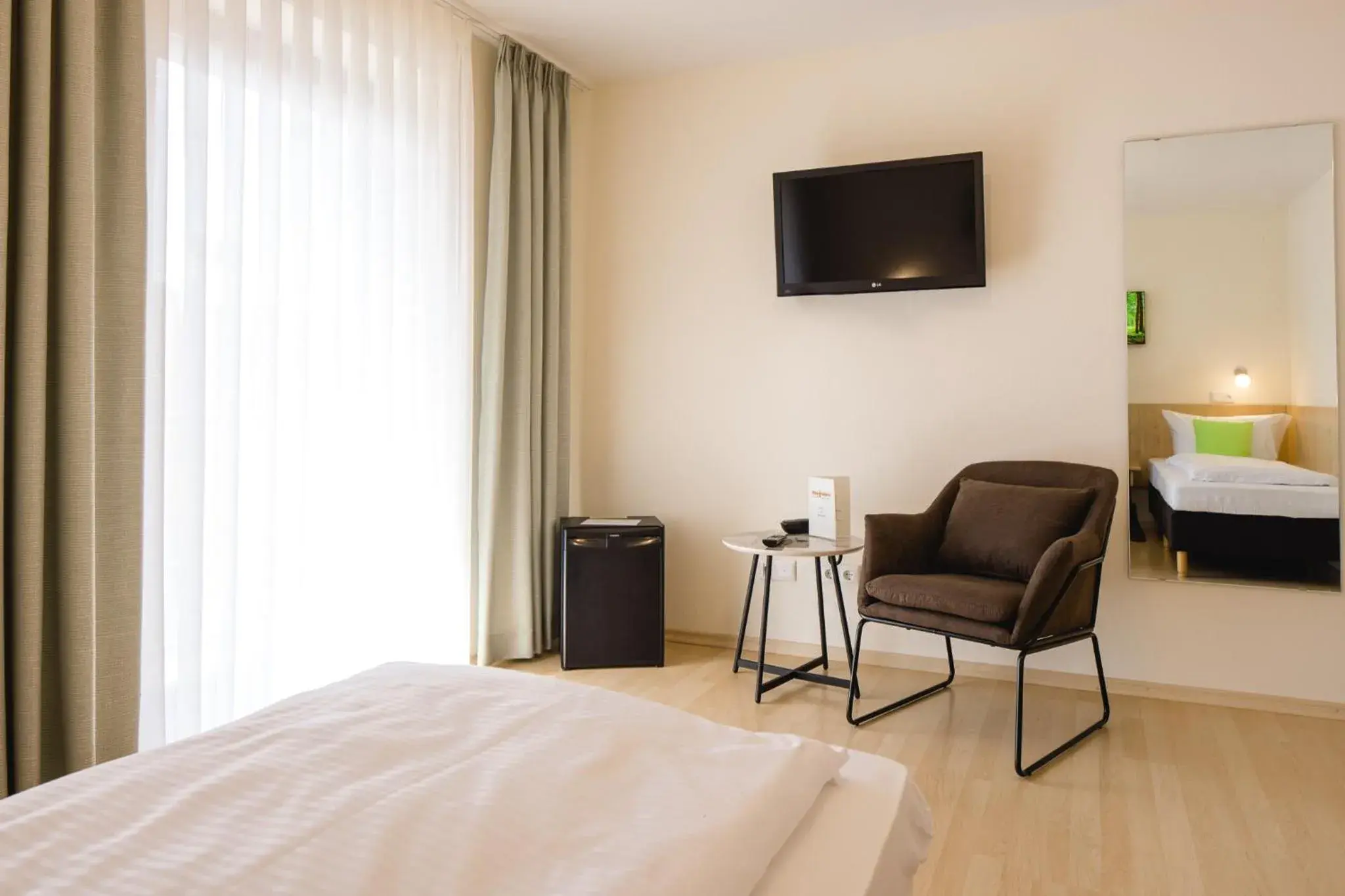 Deluxe Double or Twin Room with Balcony - single occupancy in AKZENT Hotel Meerfräulein Deluxe Double or Twin Room with Balcony - single occupancy in AKZENT Hotel Meerfräulein