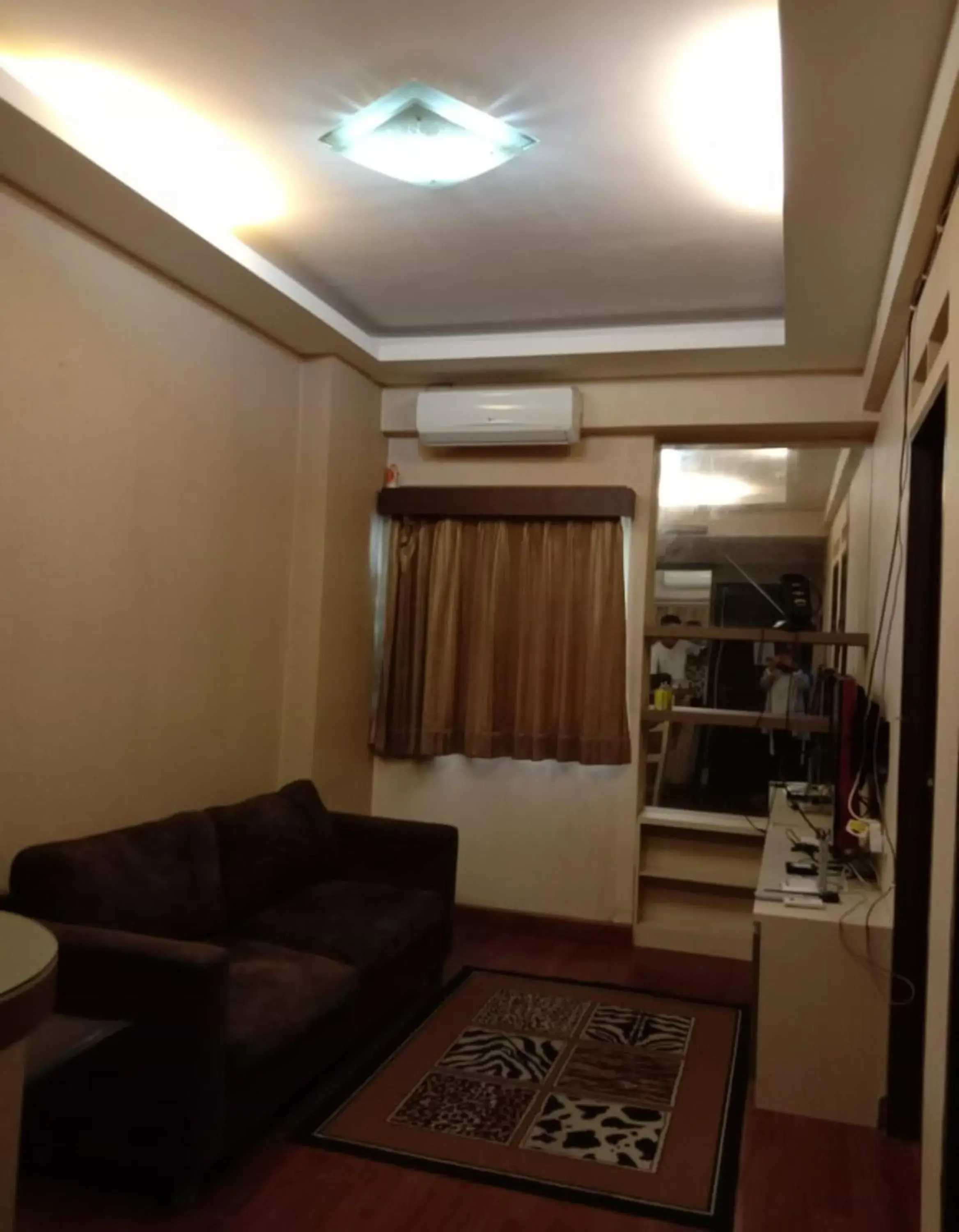 Living room in The Suites Metro Apartment by NFO Property Living room in The Suites Metro Apartment by NFO Property