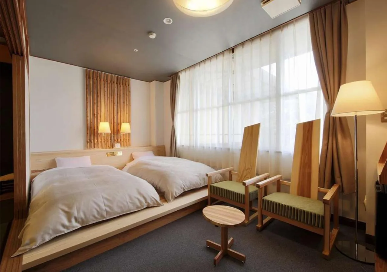 Photo of the whole room, Bed in RYOKAN OQOQ-Tamai Bekkan