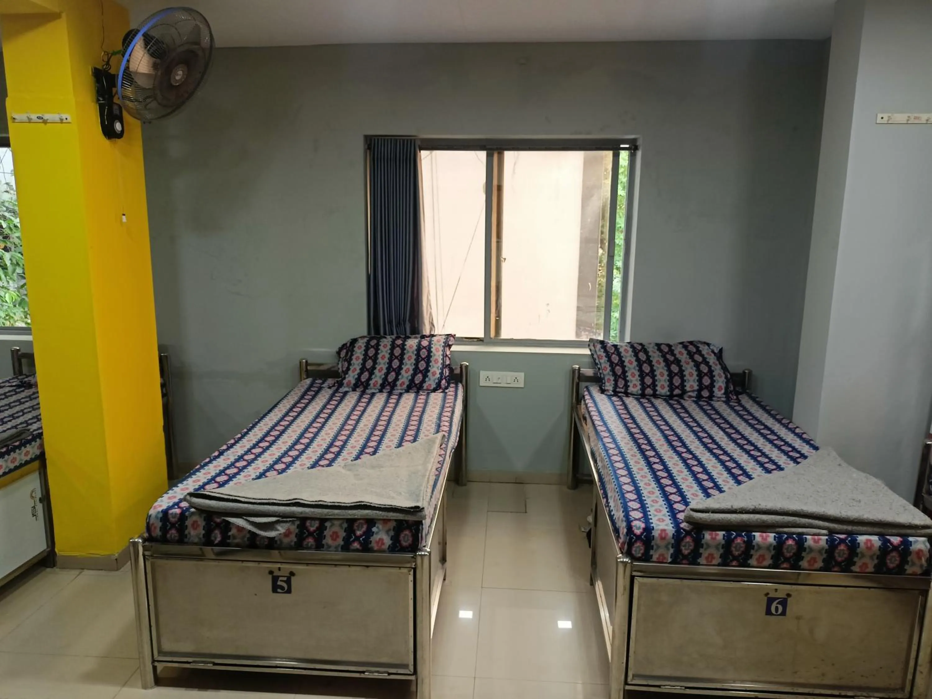 Bed in Shiv Sai Dormitory