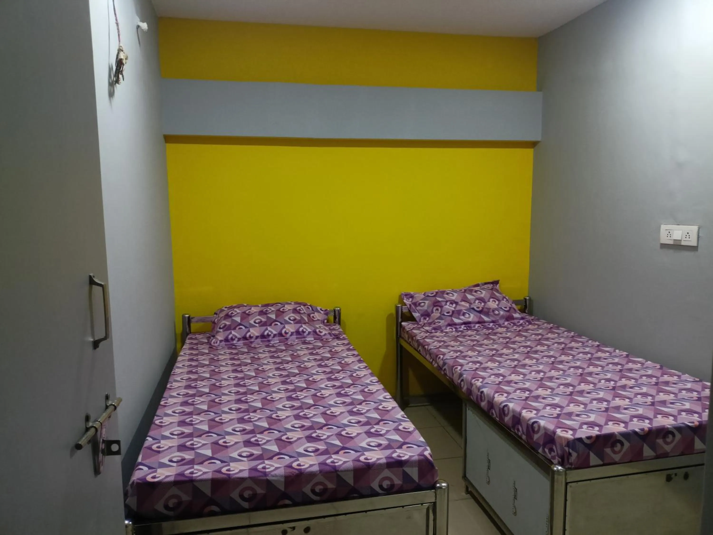 Bed in Shiv Sai Dormitory