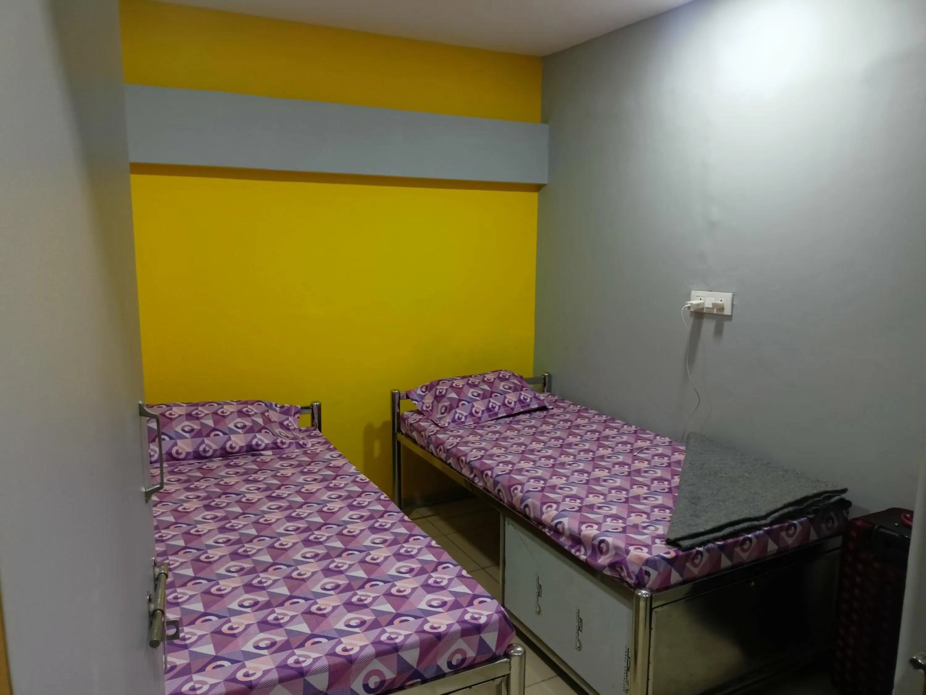 Bed in Shiv Sai Dormitory