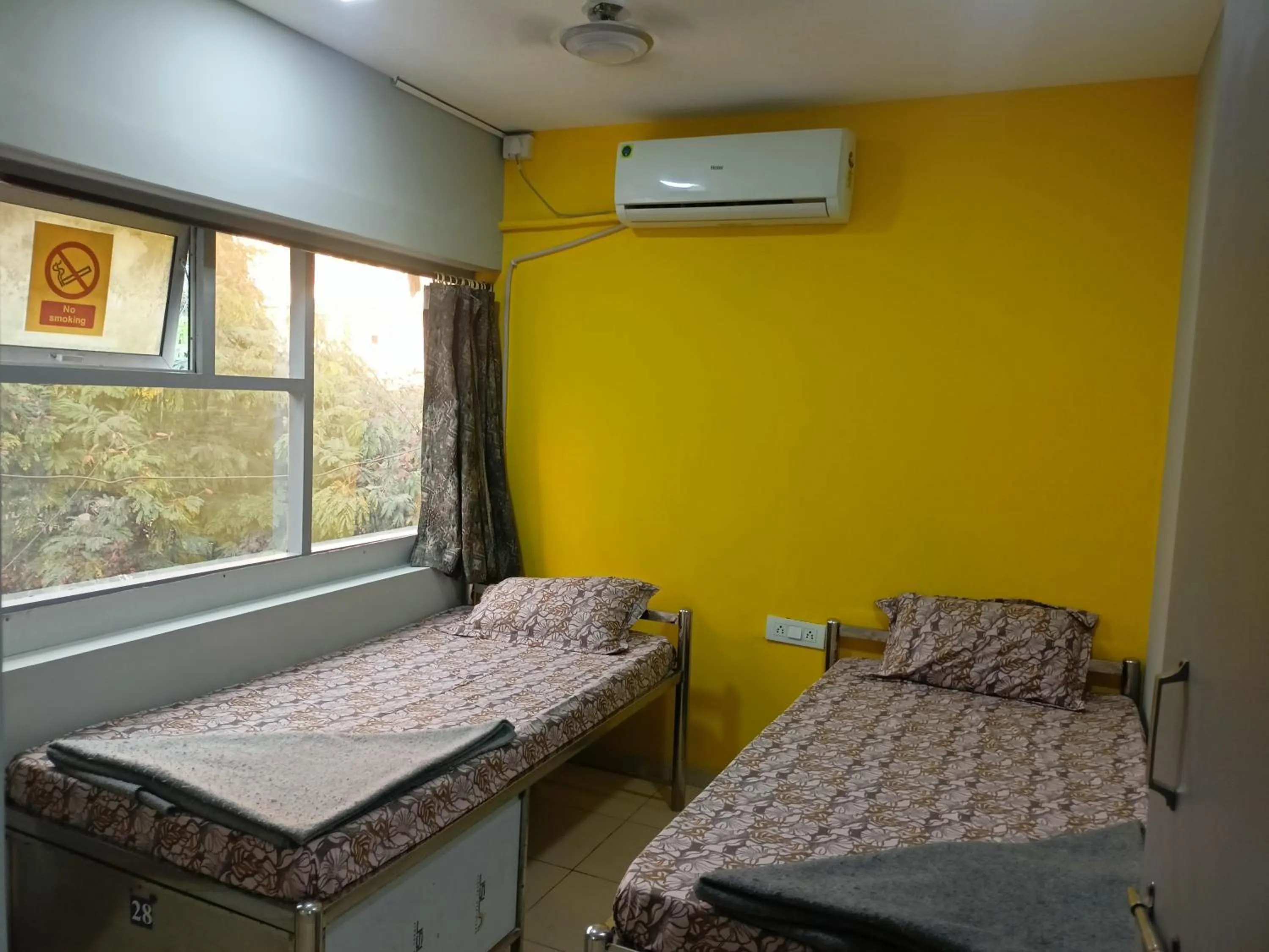 Bed in Shiv Sai Dormitory