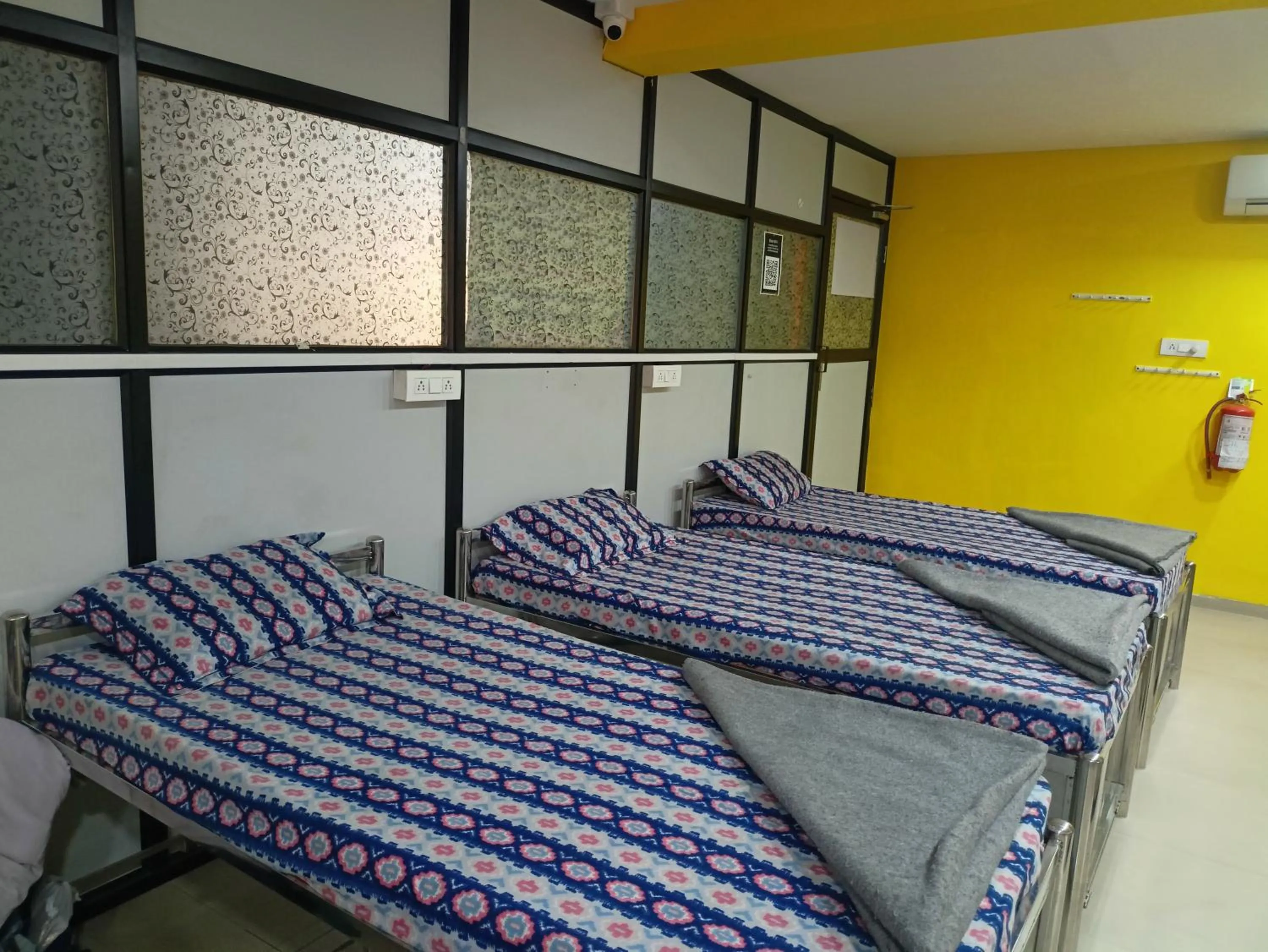 Bed in Shiv Sai Dormitory