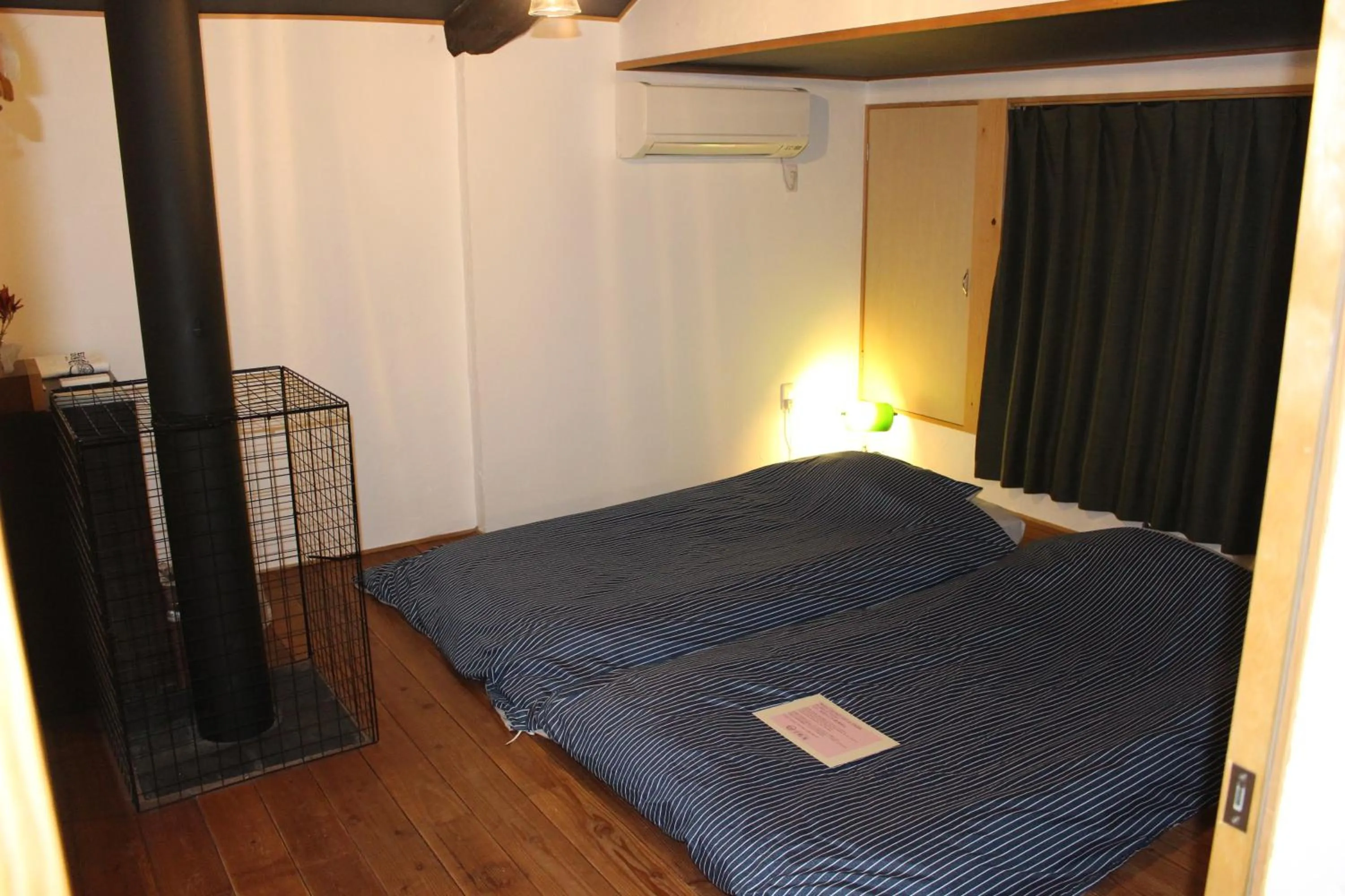 Bed in Guesthouse Izame Ann