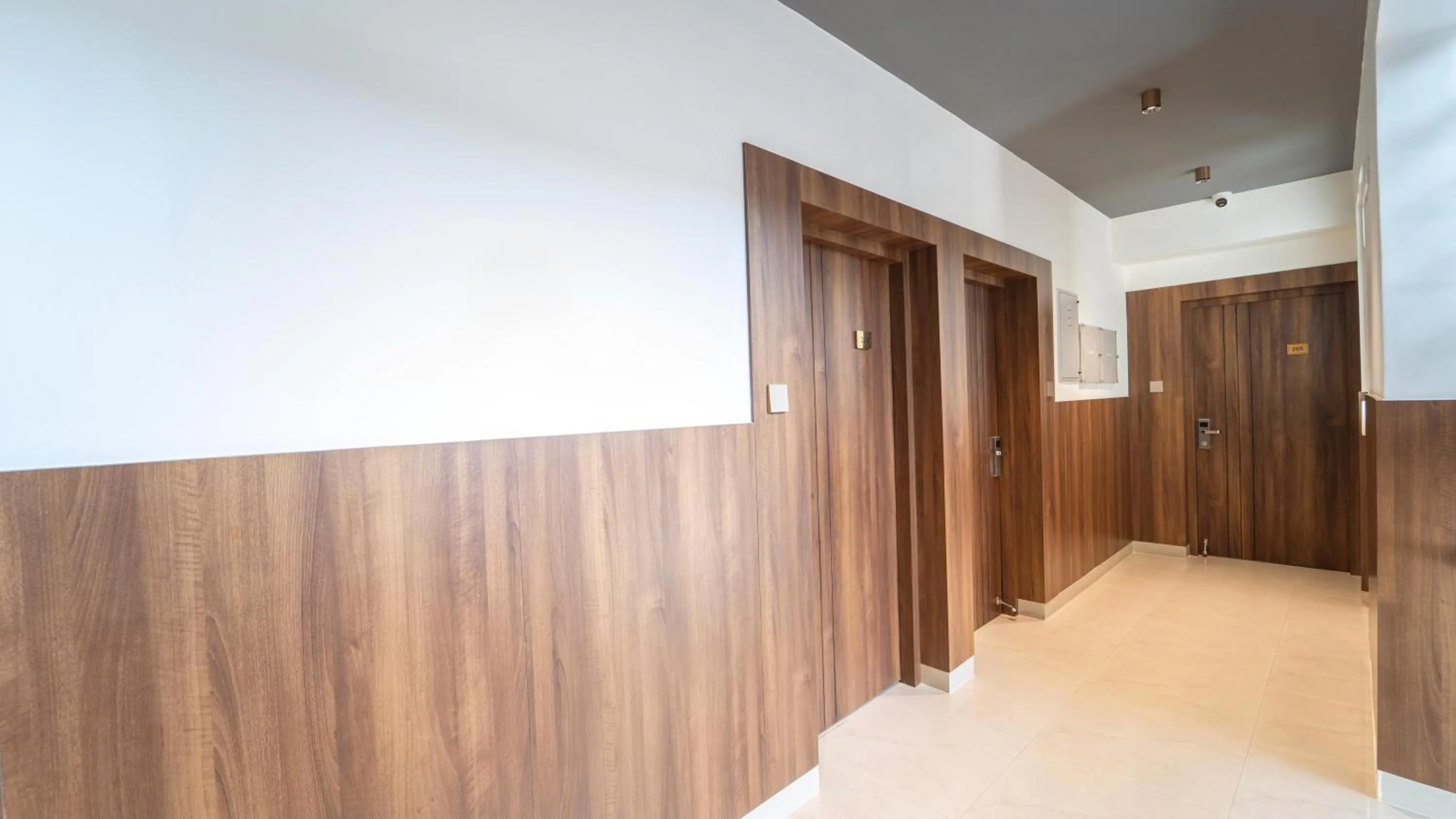 Lobby or reception, Bed in Treebo Petals Suites