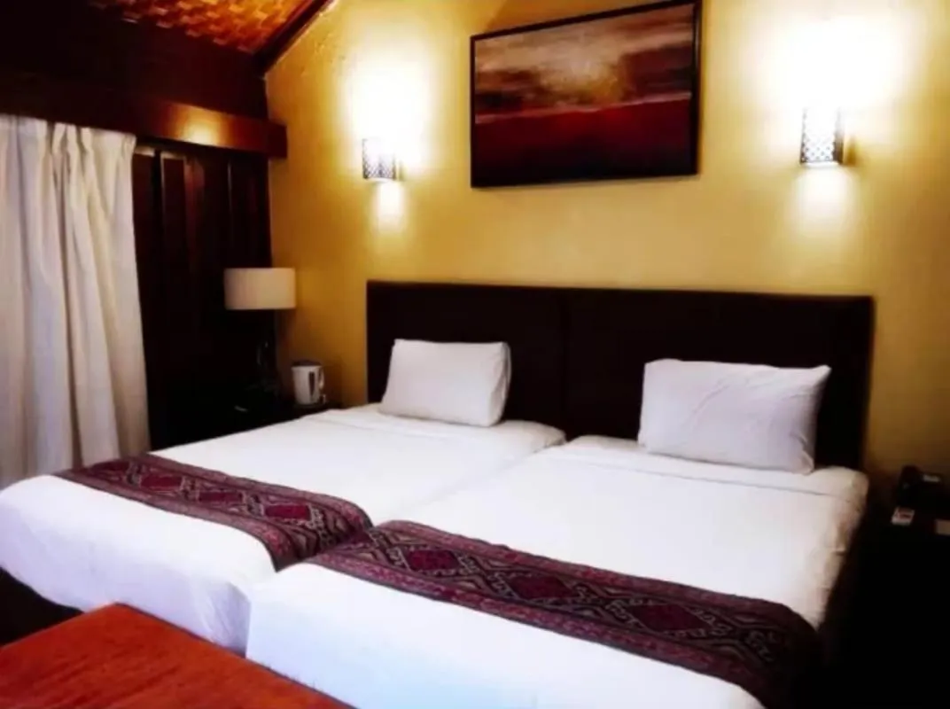 Bed in Shah's Beach Resort Melaka