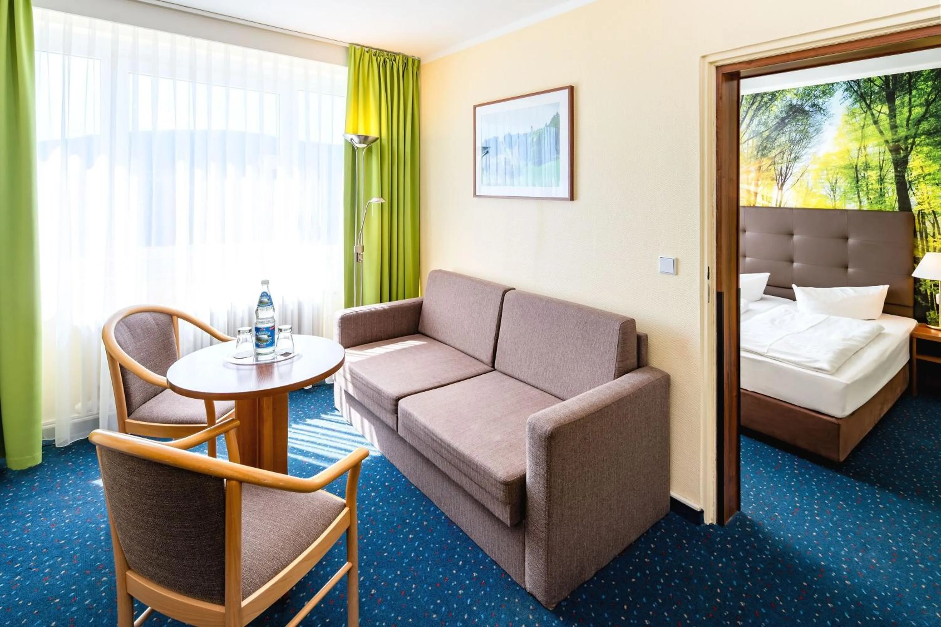 Living room, Bed in AHORN Hotel Am Fichtelberg