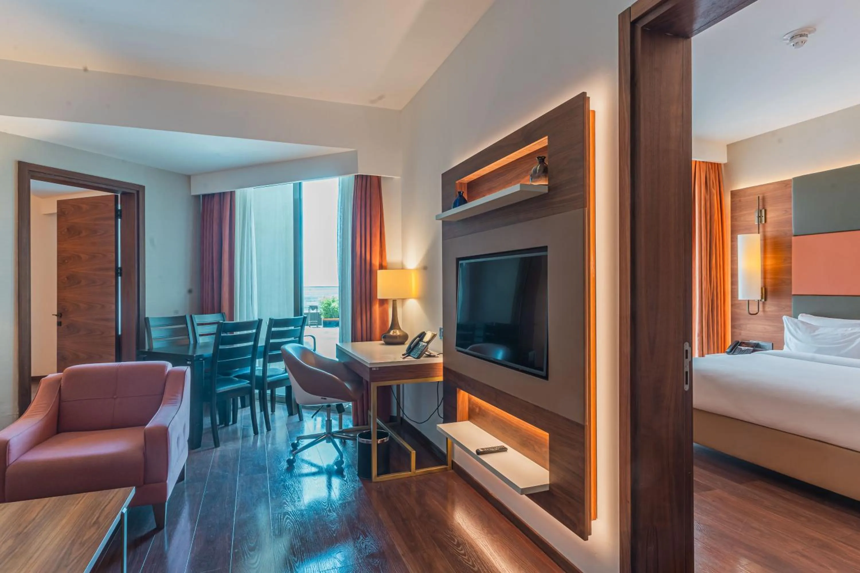 Communal lounge/ TV room, Bed in Emara Ole-Sereni