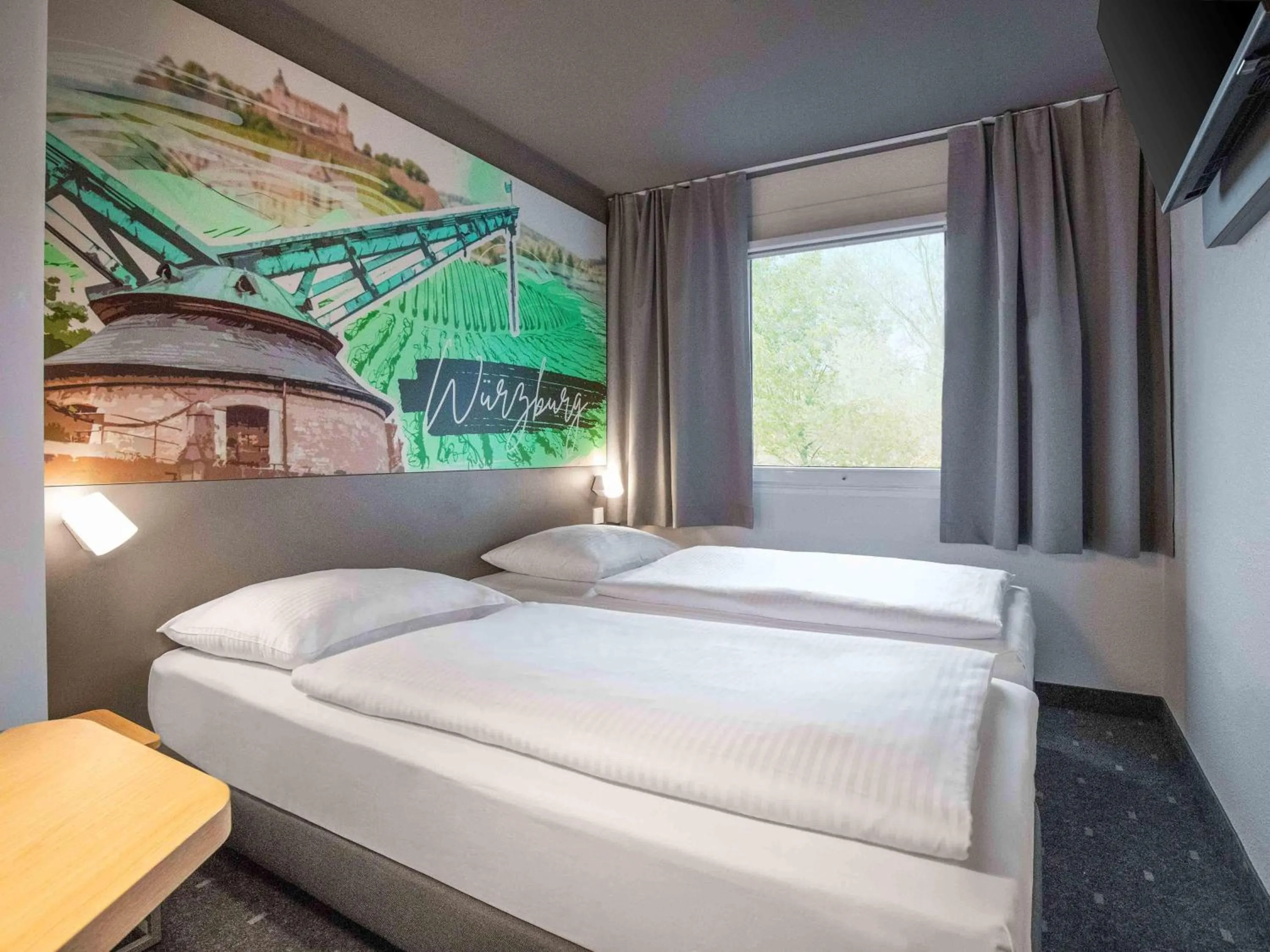 Photo of the whole room, Bed in B&B HOTEL Würzburg-Ost