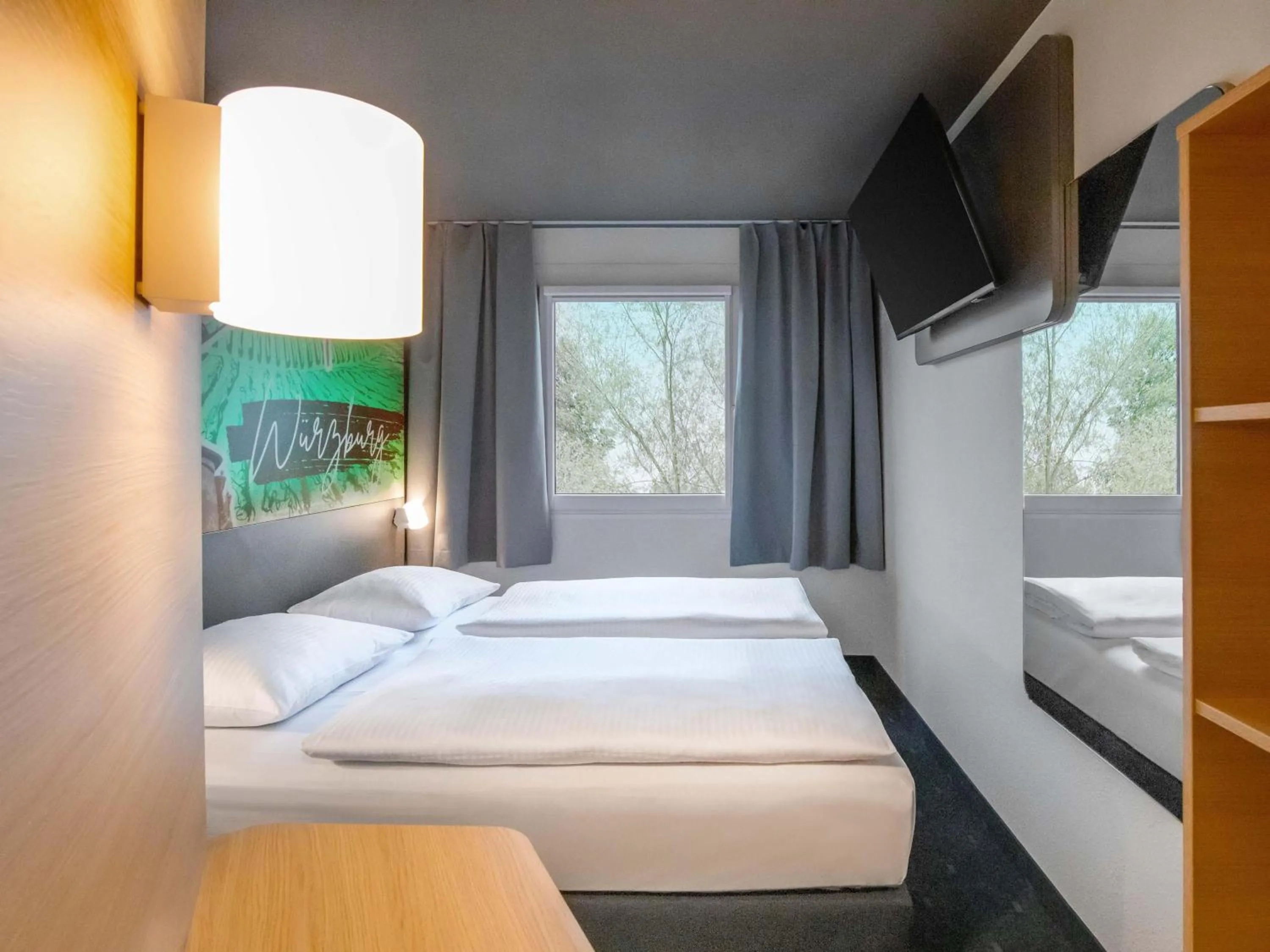 Photo of the whole room, Bed in B&B HOTEL Würzburg-Ost