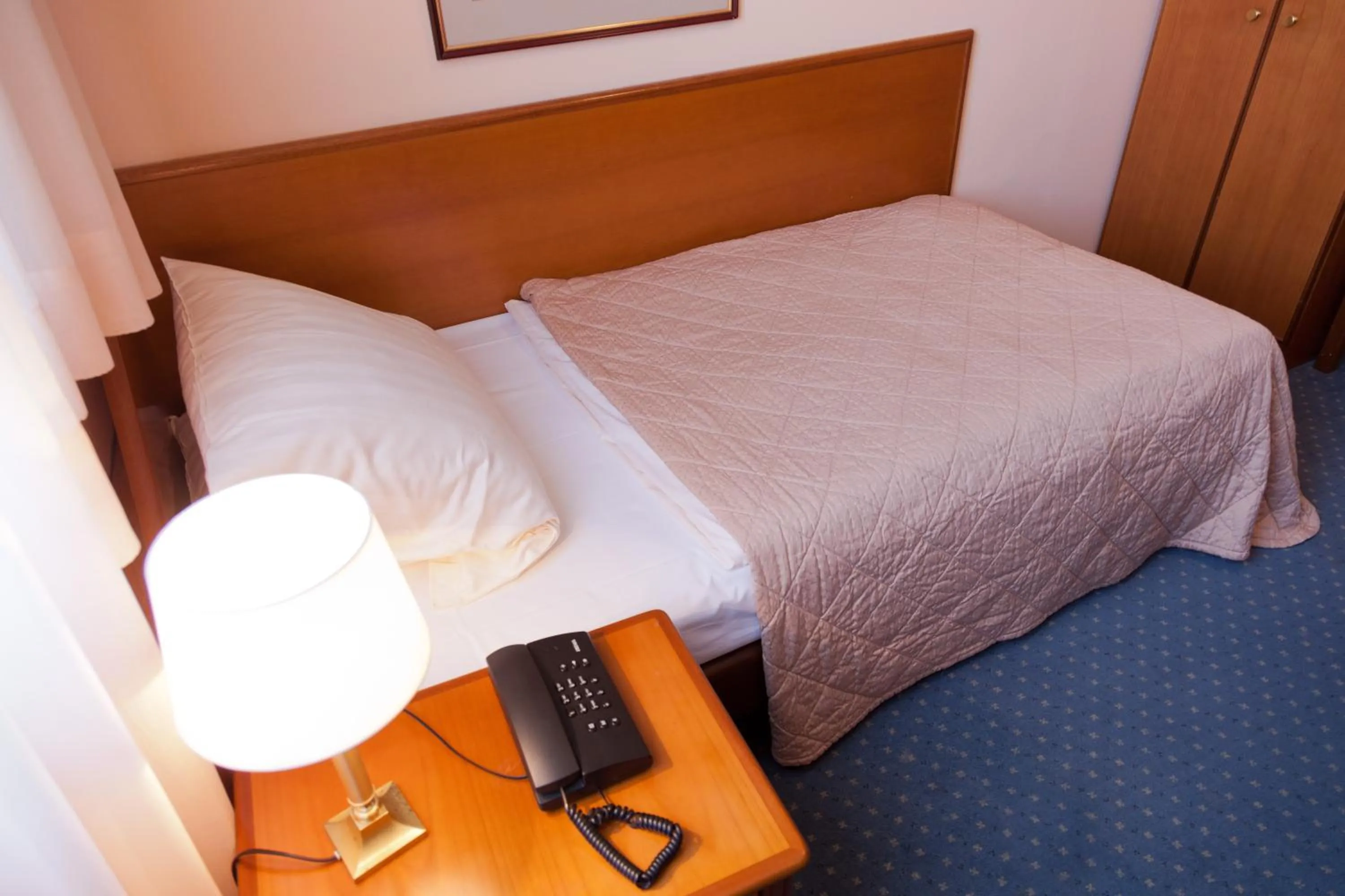 Photo of the whole room, Bed in Hotel Rubin