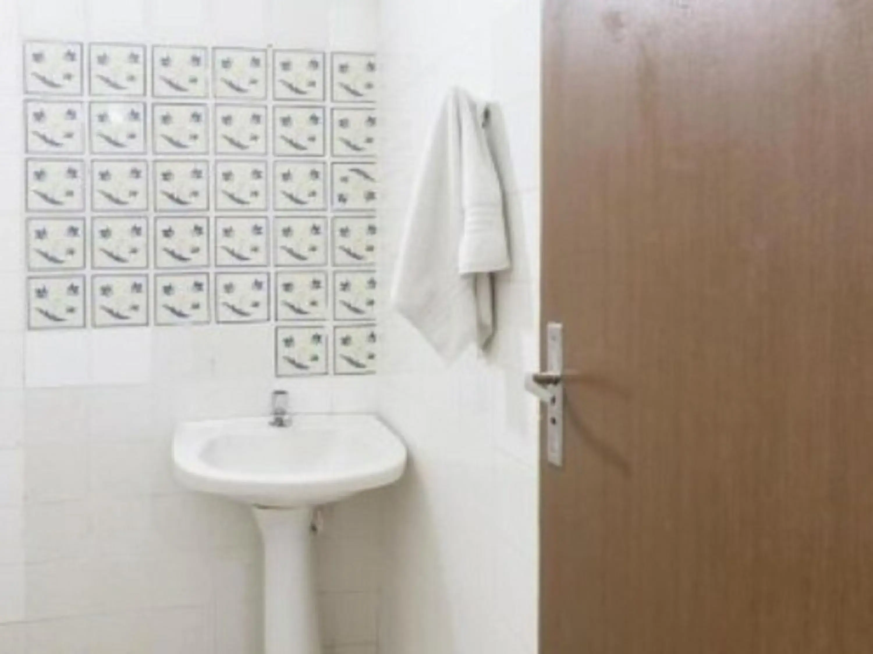 Bathroom in OYO Pousada Paraná, Cuiabá Bathroom in OYO Pousada Paraná, Cuiabá