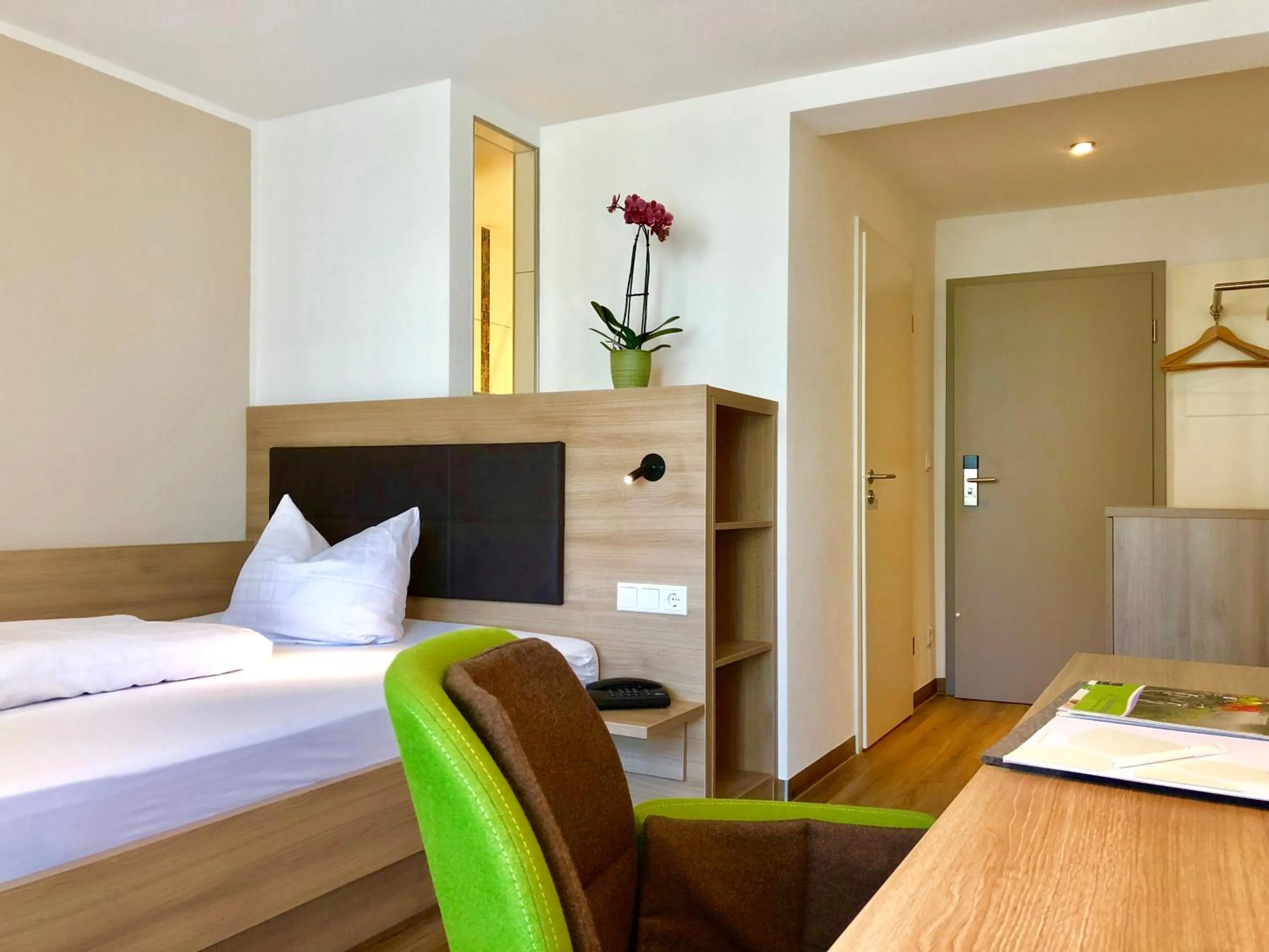 Photo of the whole room, Bed in Flair Hotel Grüner Baum