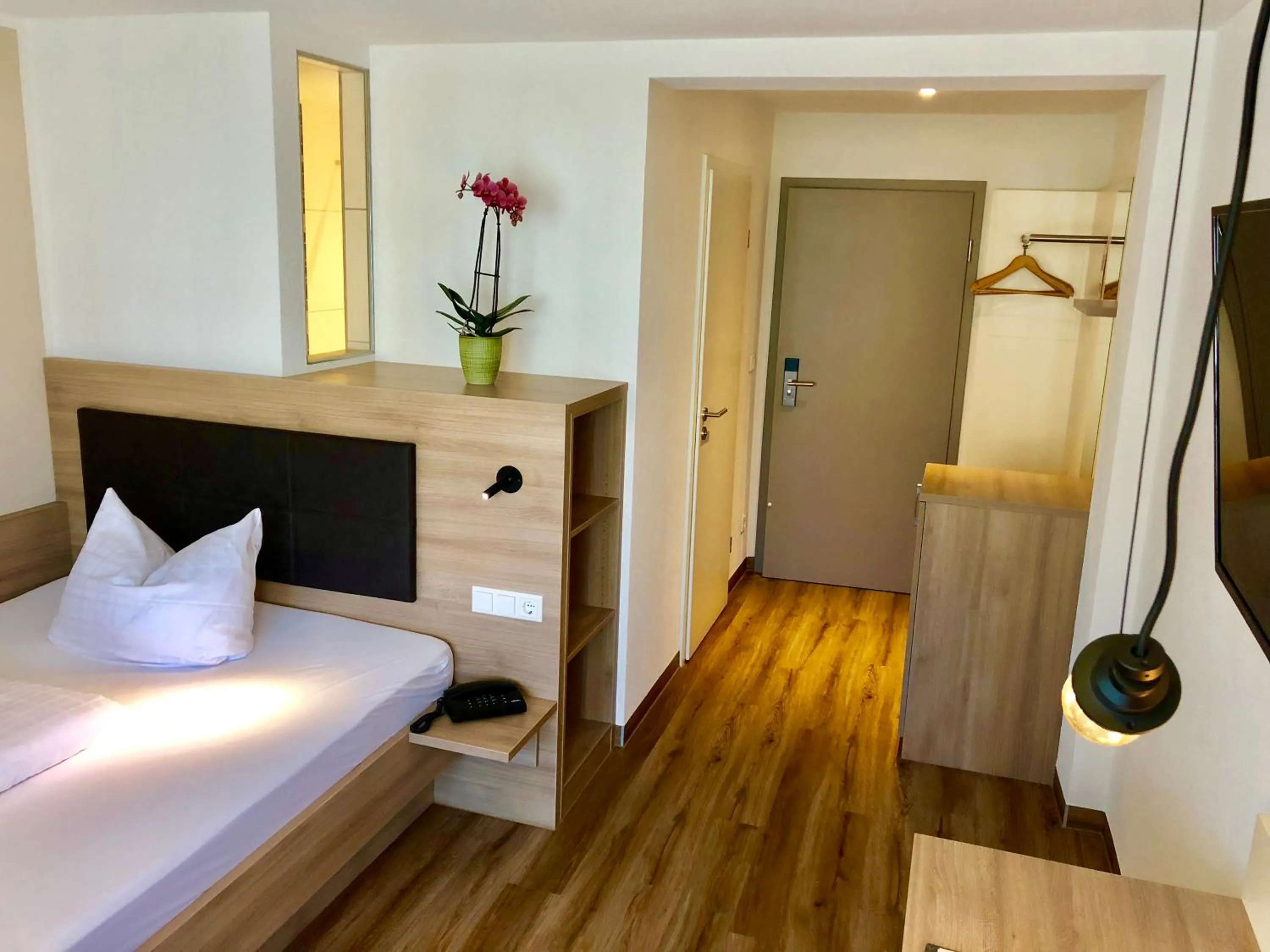 Photo of the whole room, Bed in Flair Hotel Grüner Baum