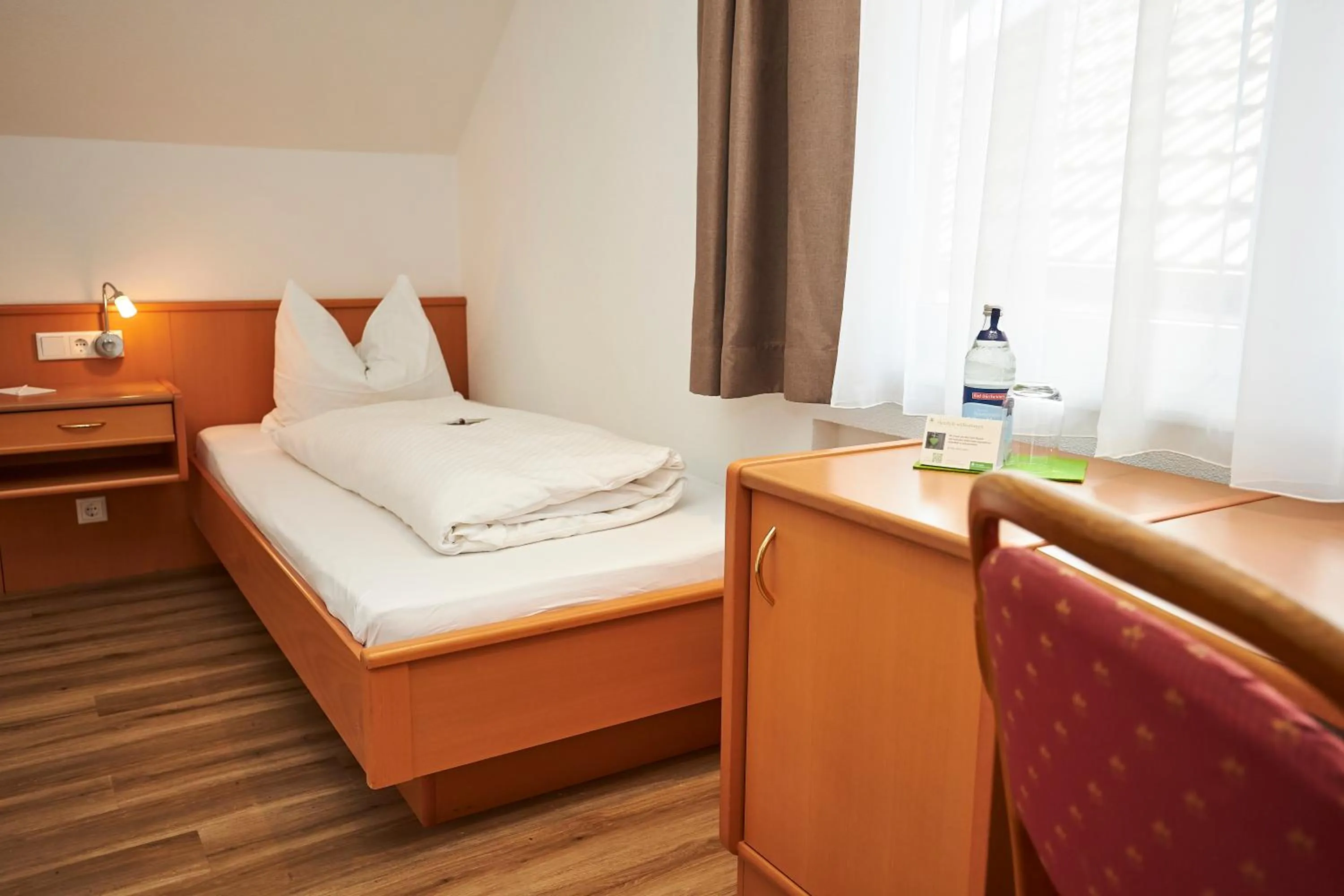 Bed in Flair Hotel Grüner Baum